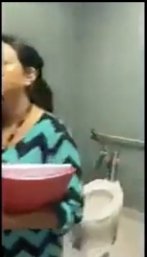 A clip showing the toilet another hidden camera was pointed at in the office | Source: tiktok.com/@texicana208