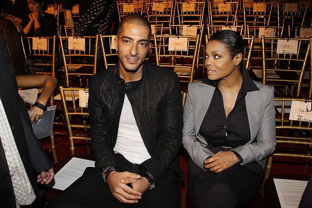 Wissam Al Mana and Janet Jackson attend the John Galliano Ready to Wear Spring/Summer 2011 show during Paris Fashion Week at Opera Comique on October 3, 2010 | Photo: Getty Images