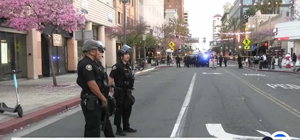 Long Beach police officers secure the area near Pine Avenue following the incident | Source: YouTube/@ABC7