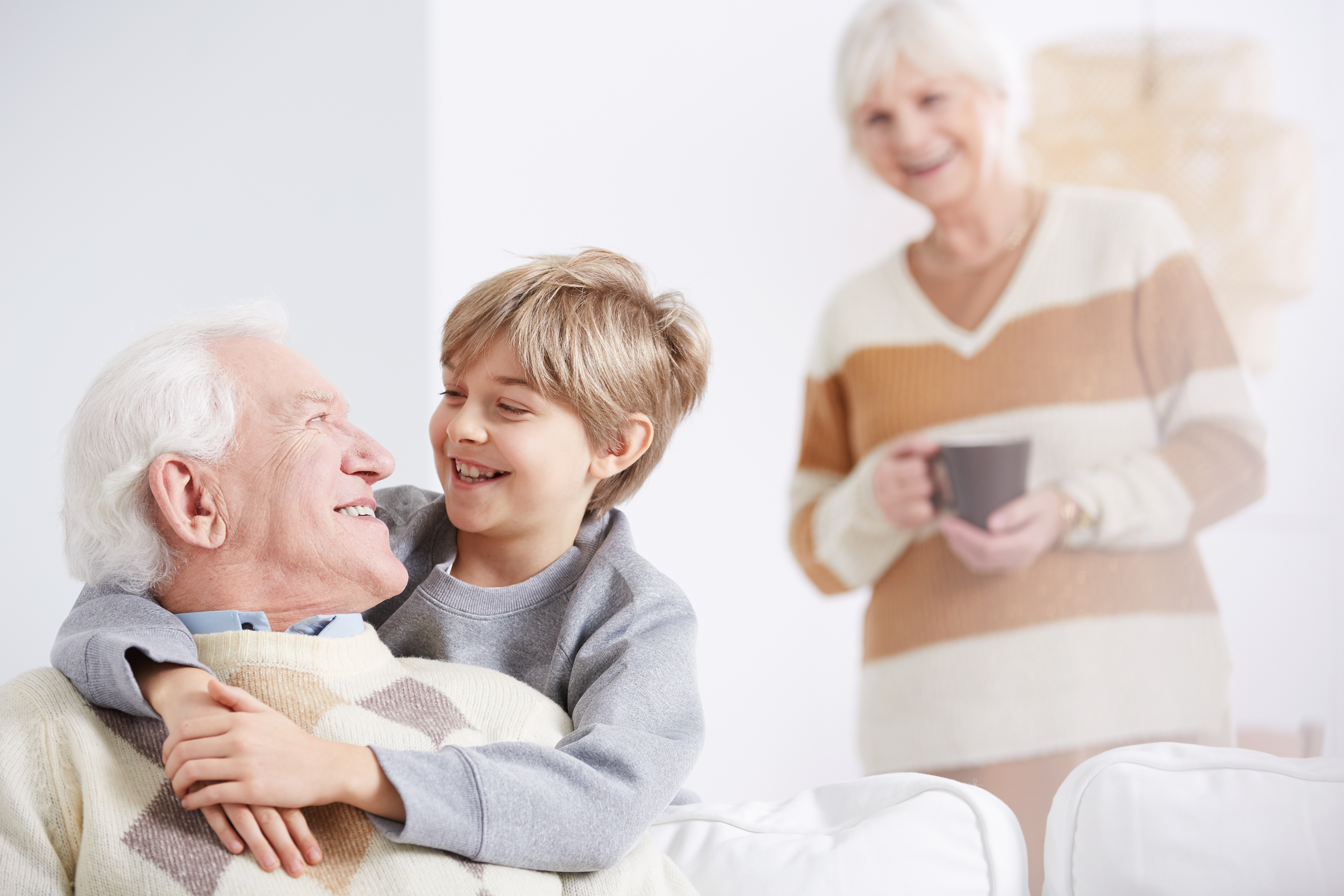 Grandparents with grandson | Shutterstock