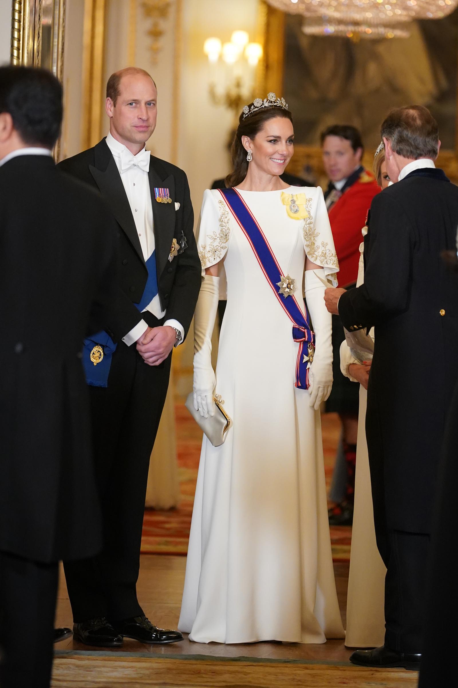 Prince William, Prince of Wales, and Catherine, Princess of Wales, arrive for a a State Banquet at Buckingham Palace in central London on November 21, 2023, for South Korea's President Yoon Suk Yeol and his wife Kim Keon Hee on their first day of a three-day state visit to the UK. | Source: Getty Images
