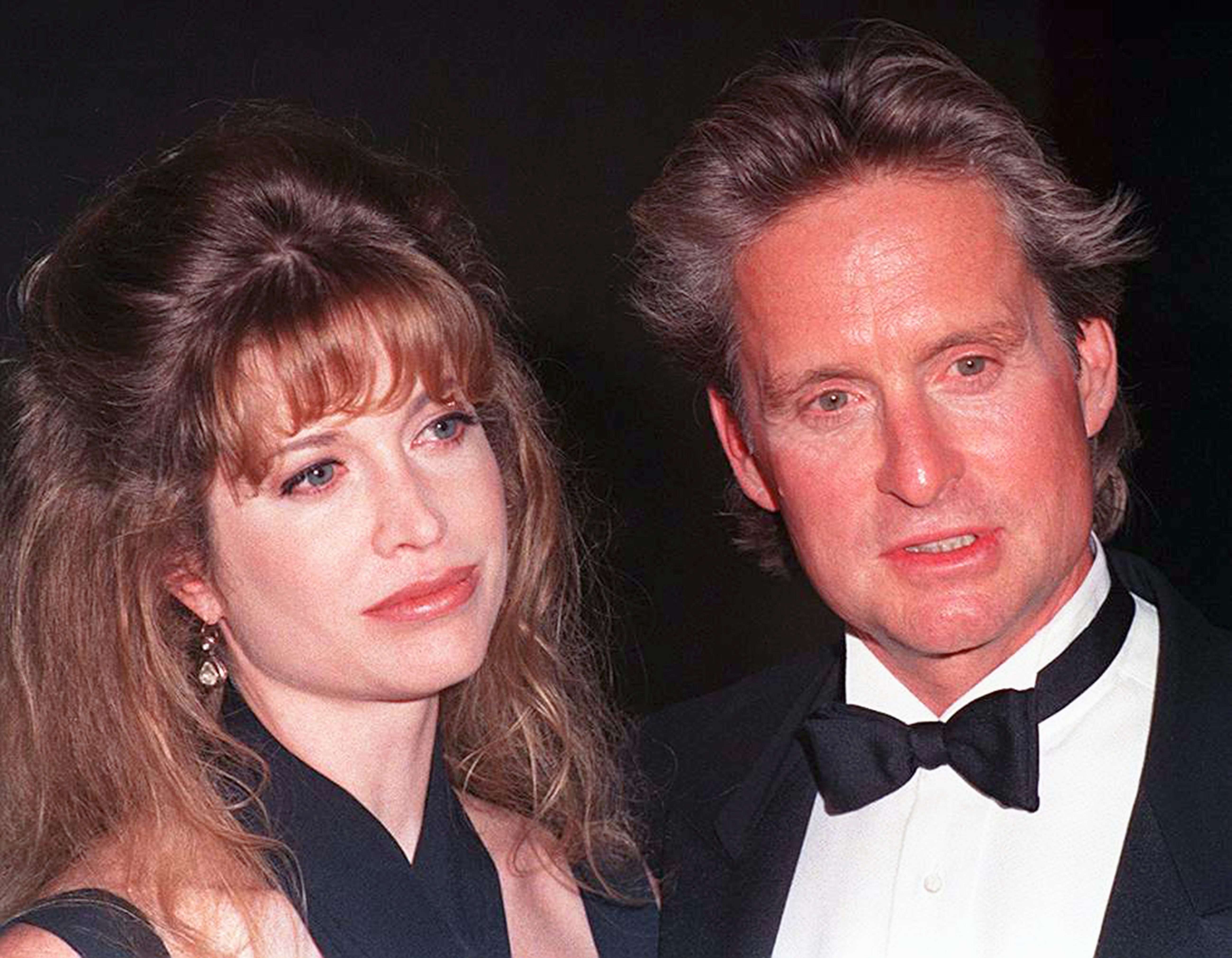 Michael Douglas with his wife Diandra at the American Cinematheque's Eighth Annual Moving Picture Ball in Los Angeles, California, on September 29, 1993. | Source: Getty Images.