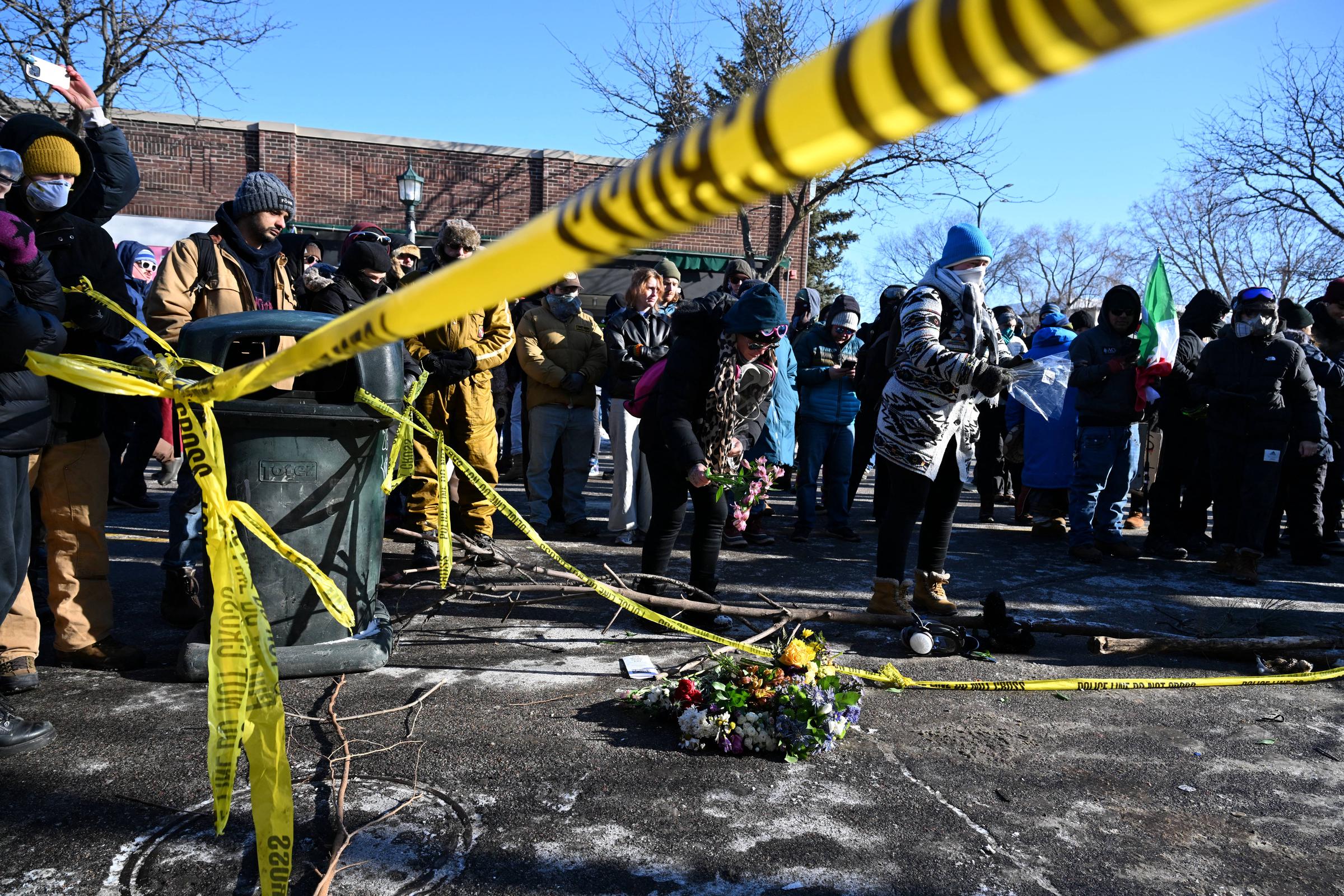 People pay their respects where a Alex Pretti was shot and killed by federal immigration agents in Minneapolis, Minnesota, on January 24, 2026. | Source: Getty Images