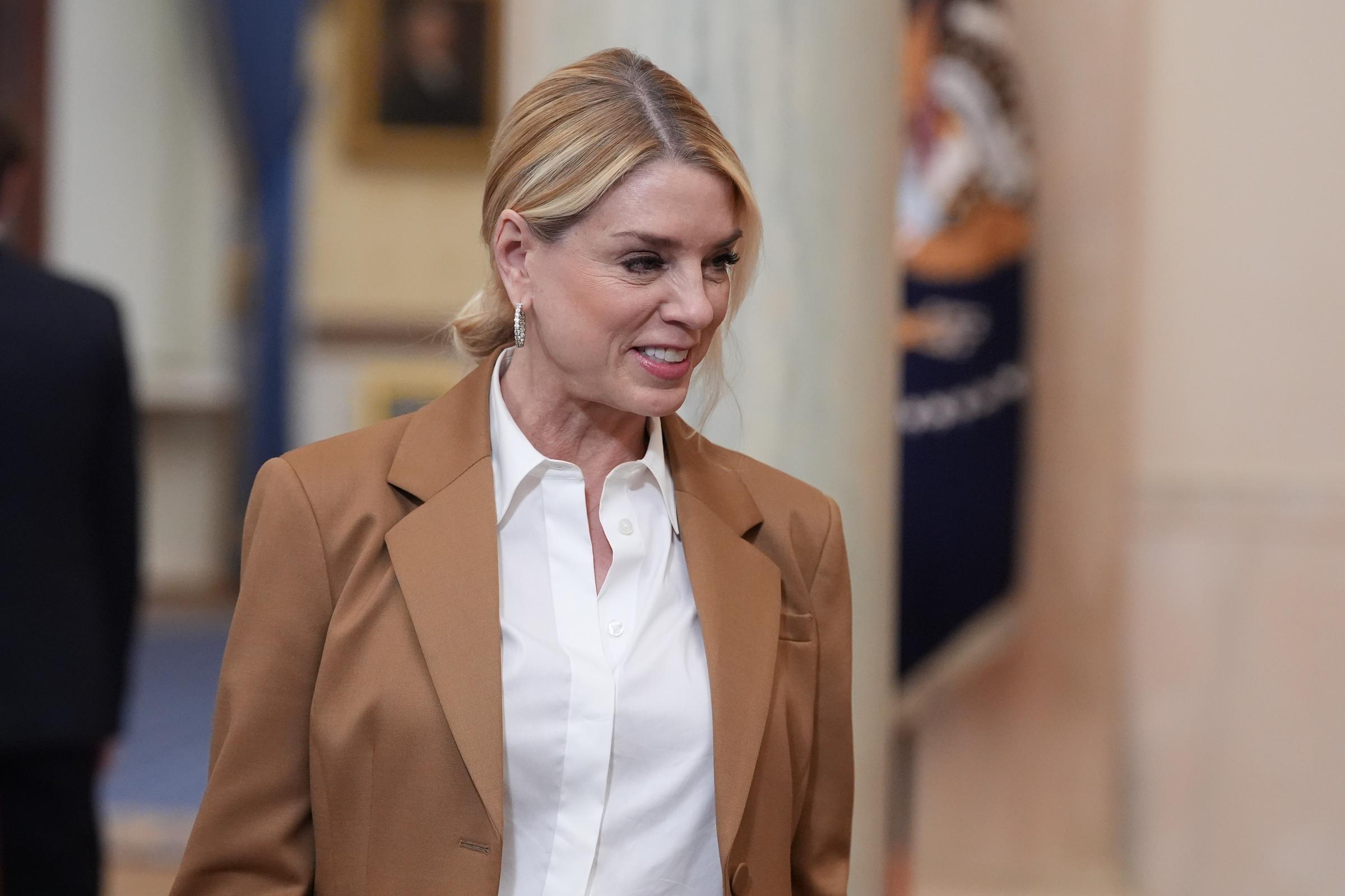 Pam Bondi arrives before President Donald Trump speaks about the Iran war from the Cross Hall of the White House in Washington, DC  on April 1, 2026. | Source: Getty Images