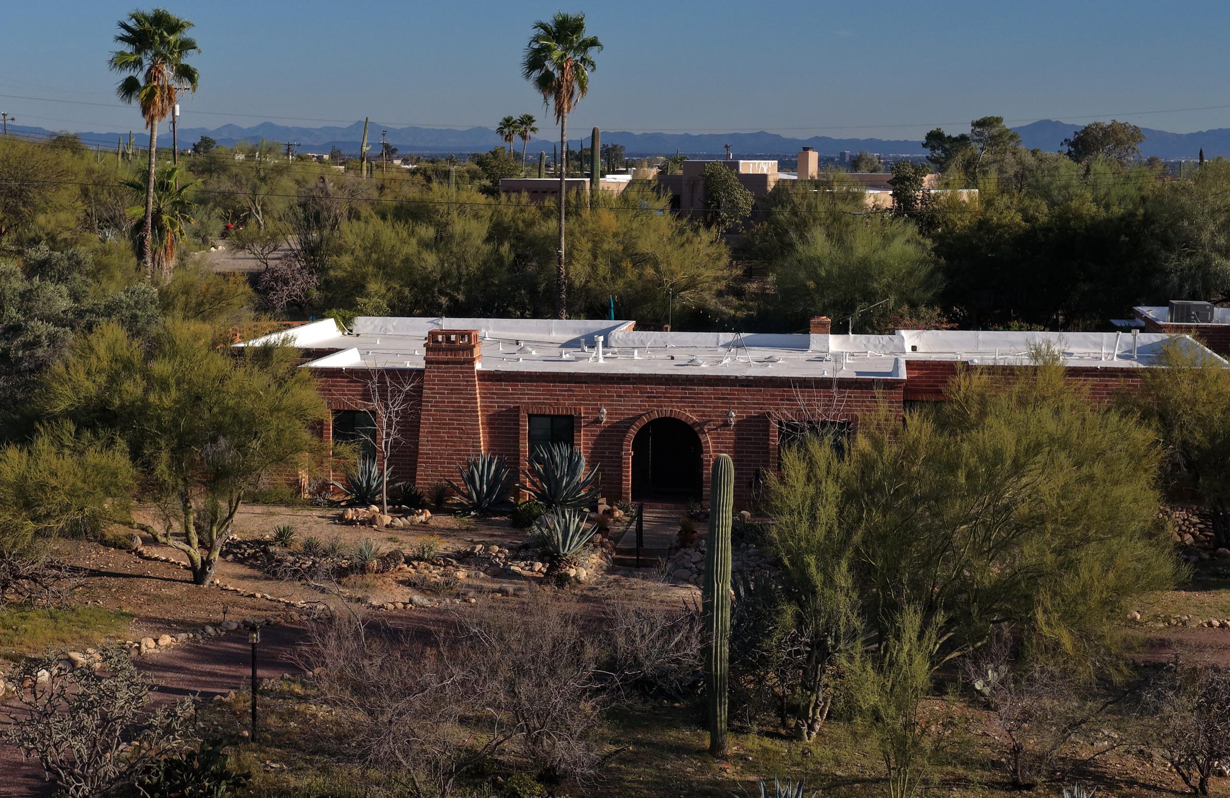 An aerial view shows Nancy Guthrie's home amid ongoing search efforts in Tucson, Arizona, on March 2, 2026 | Source: Getty Images