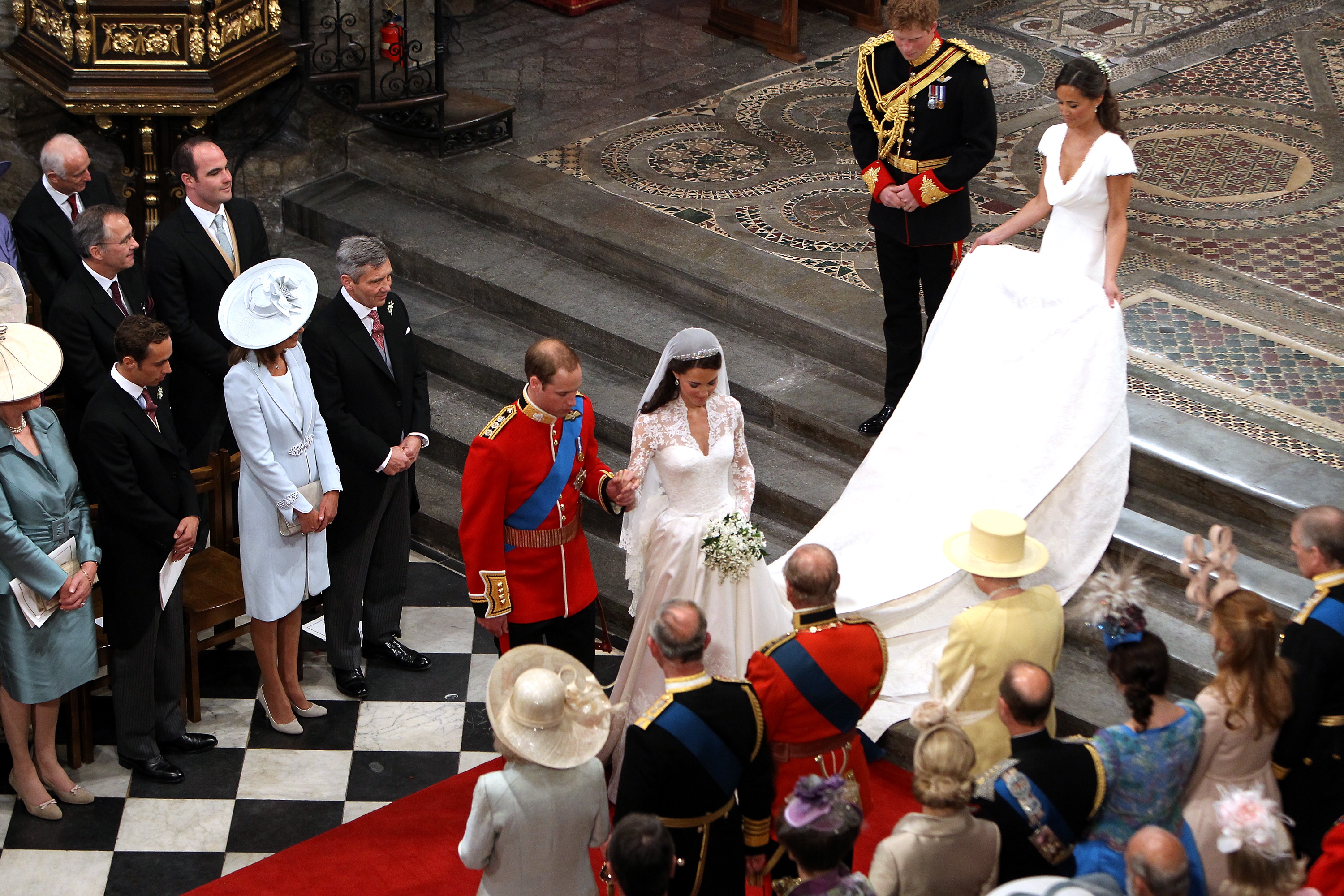 Prince William and Catherine Middleton bow to Queen Elizabeth II at the close of their wedding ceremony on April 29, 2011 in London, England. | Source: Getty Images