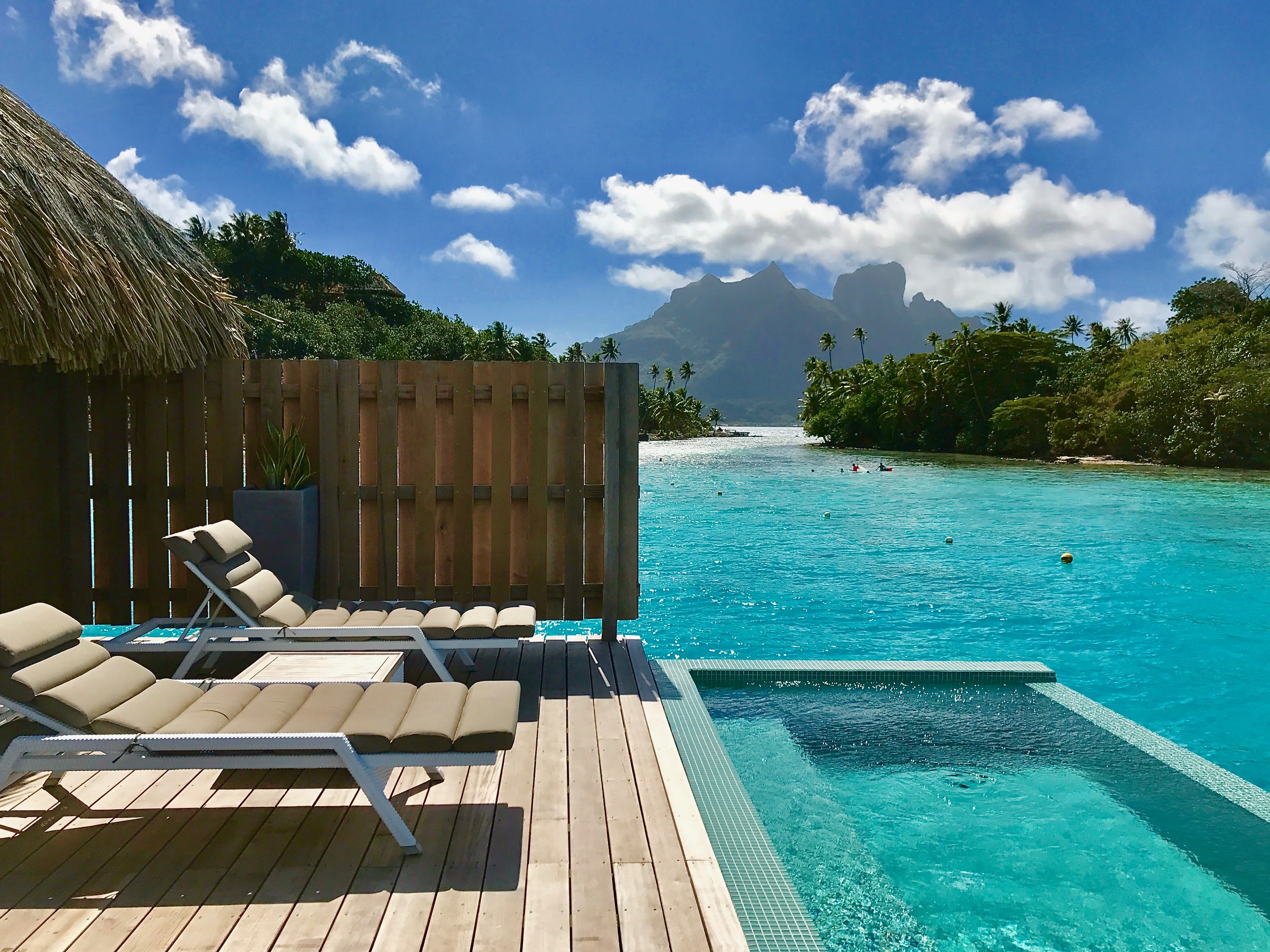 A sundeck with a pool overlooking the beach | Source: Shutterstock