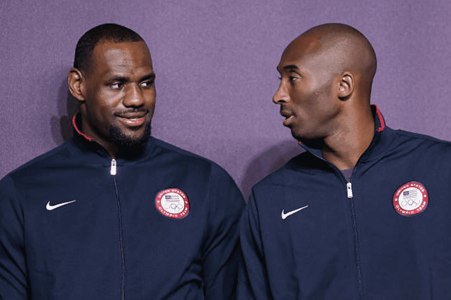 LeBron James and Kobe Bryant stare at each other during a press conference for the London 2012 Olympics, on July 27, 2012, in London, England | Source: Jeff Gross/Getty Images