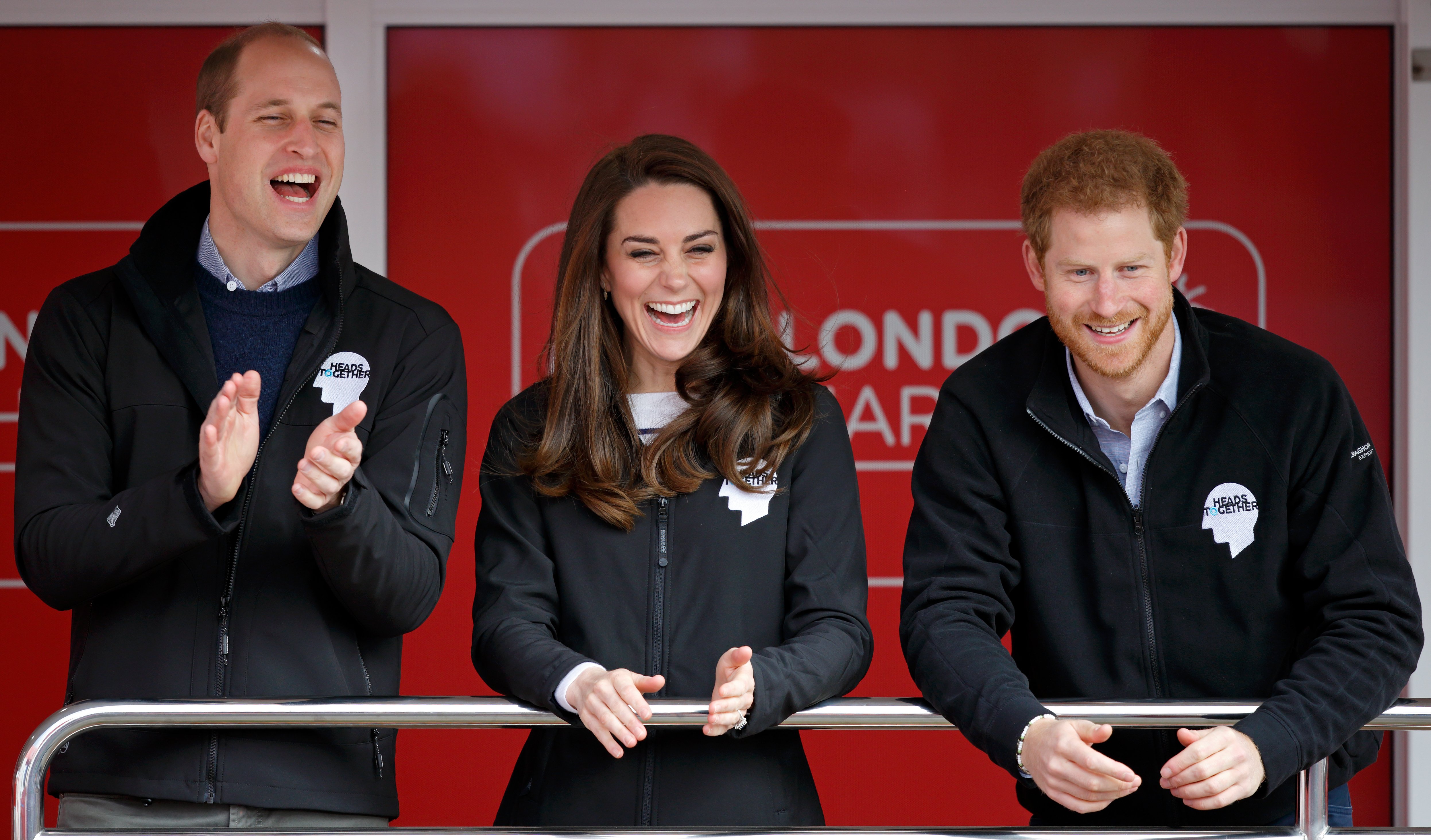 Prince William, Duke of Cambridge, Catherine, Duchess of Cambridge and Prince Harry cheer on runners as they start the 2017 Virgin Money London Marathon on April 23, 2017 in London, England. | Source: Getty Images