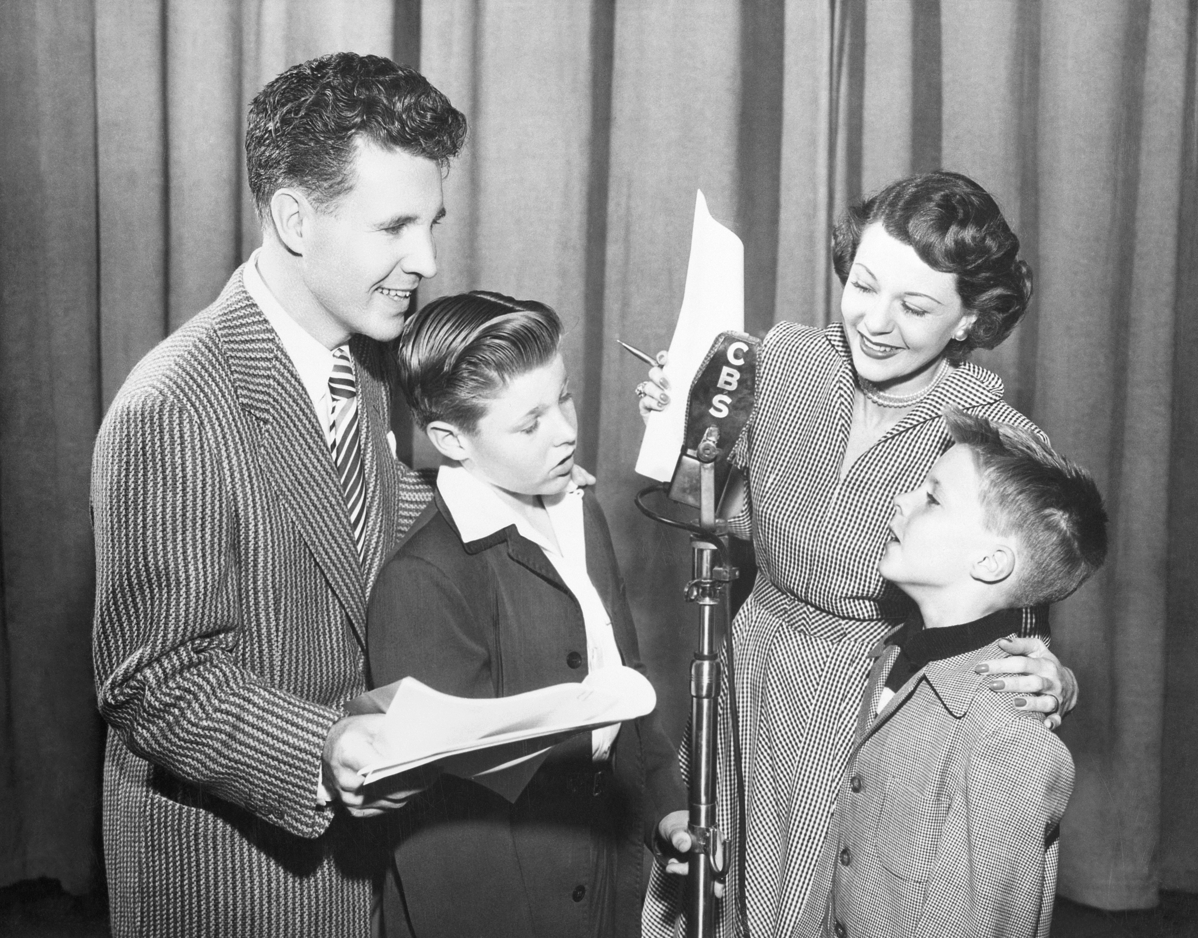 The singer's parents broadcasting with their children on CBS Radio. | Source: Getty Images