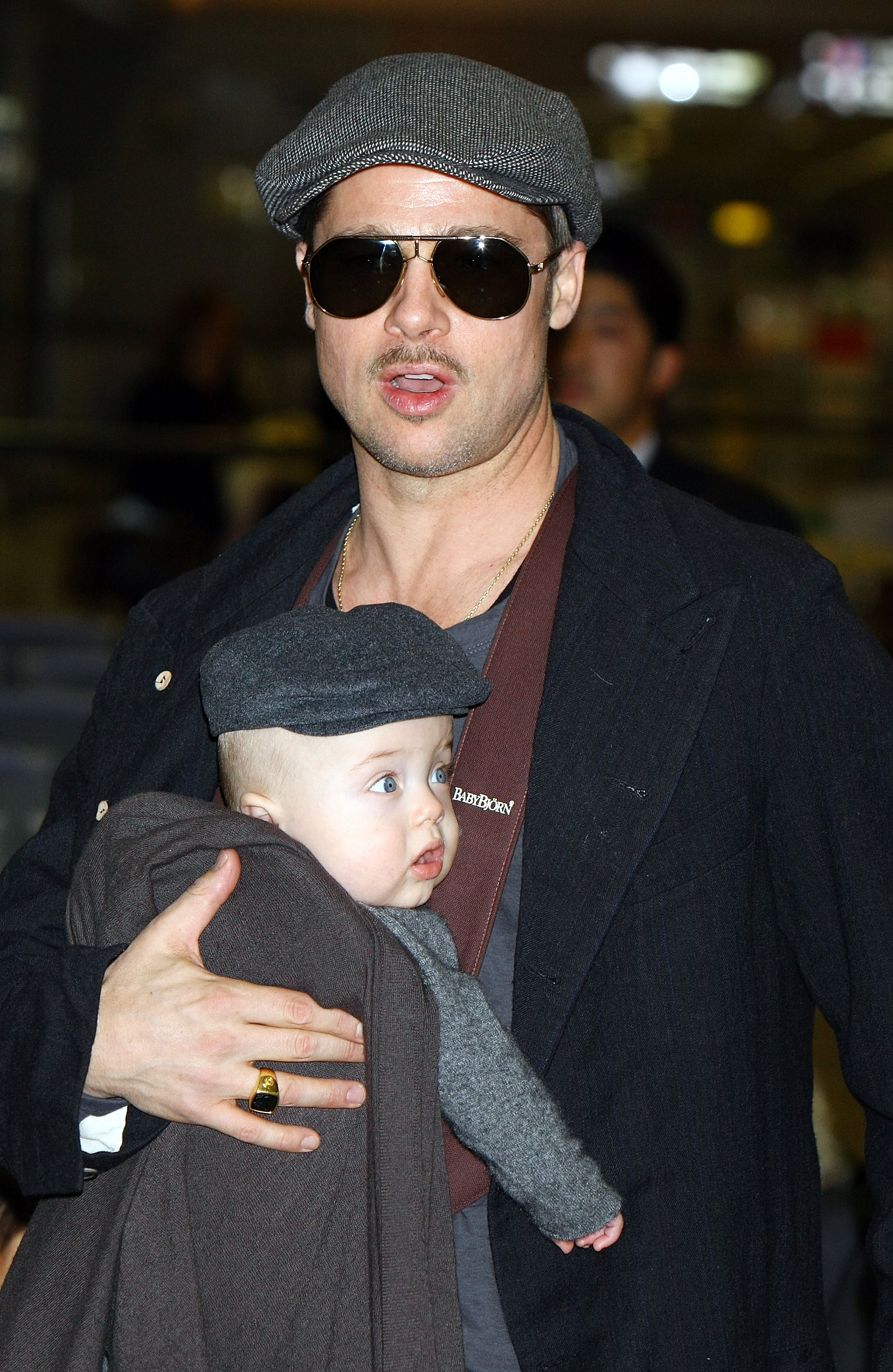 Brad Pitt and Knox Jolie-Pitt arrive at Narita International Airport on January 27, 2009, in Narita, Chiba, Japan.