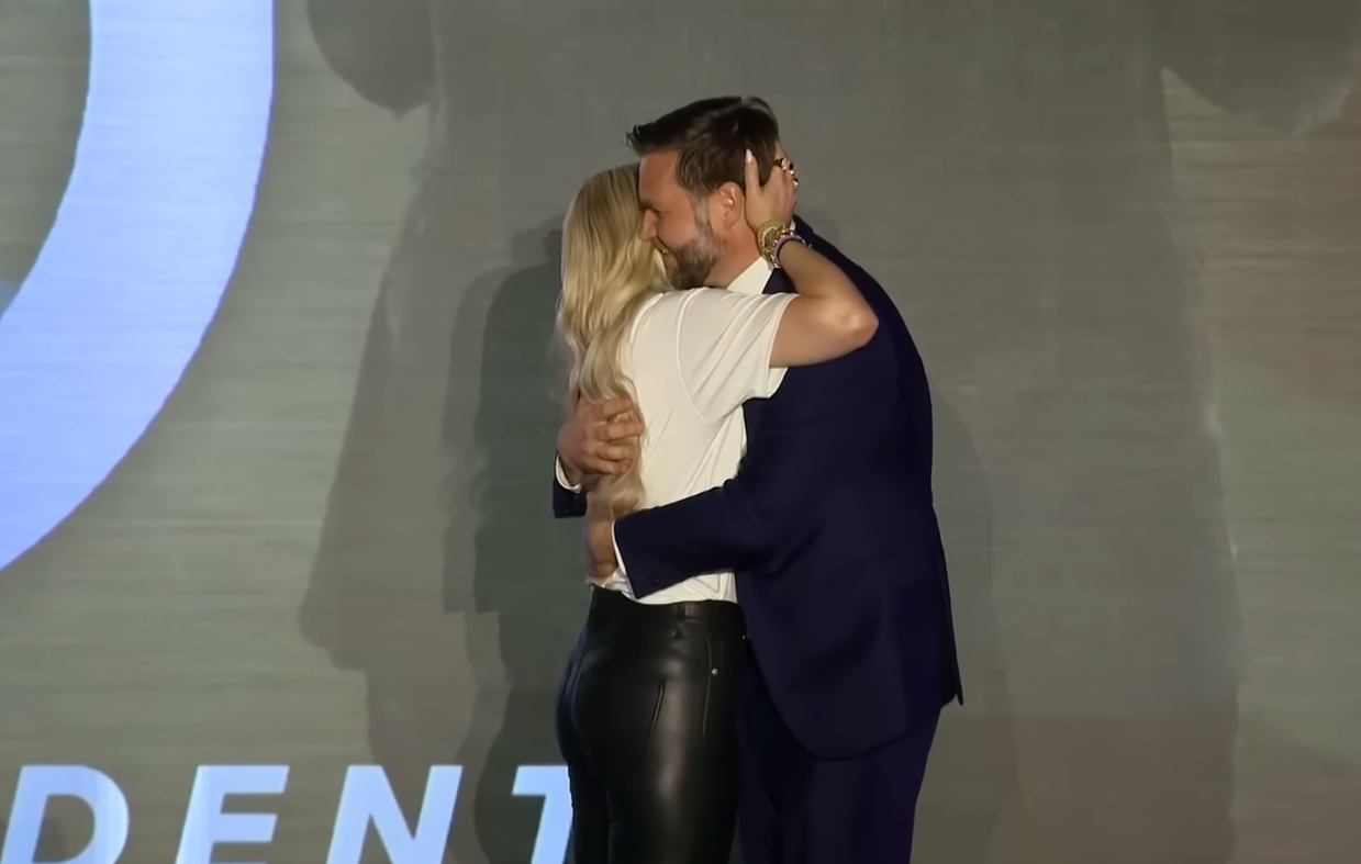 Erika Kirk and U.S. Vice President JD Vance exchanging a hug and some words during the Turning Point USA event, posted on November 3, 2025. | Source: YouTube/11Alive