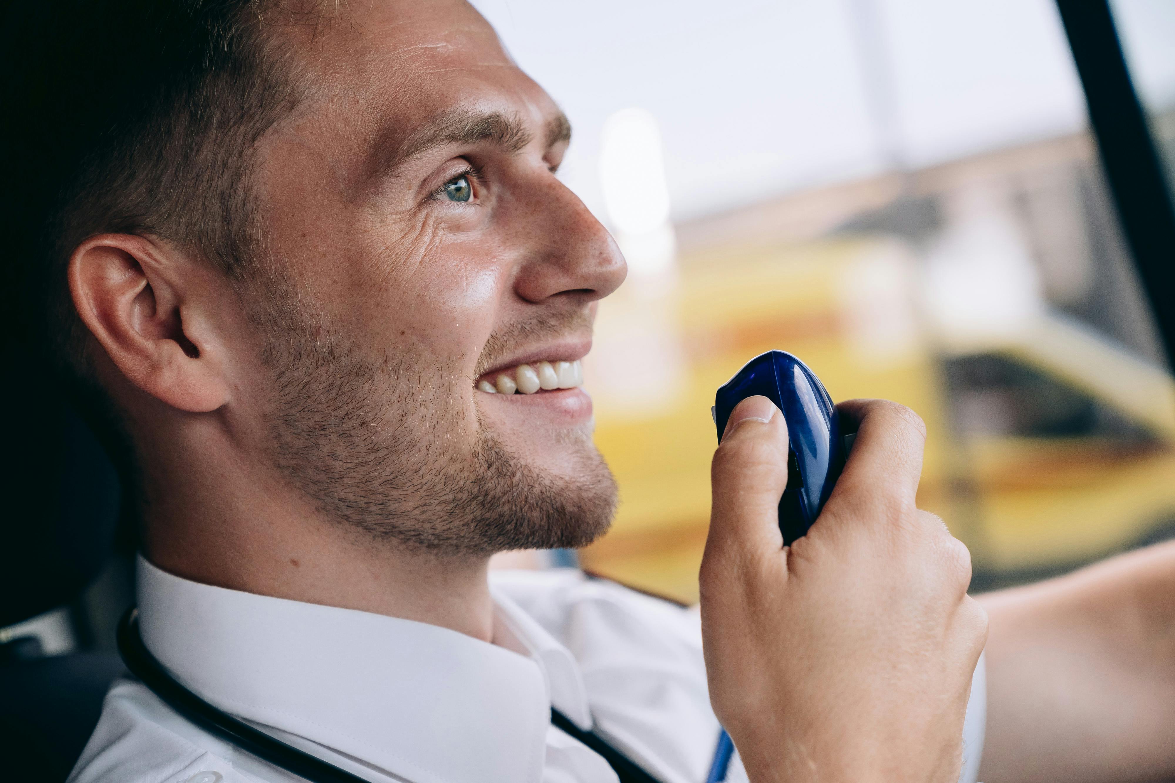 A man talking on a VHF Radio | Source: Pexels