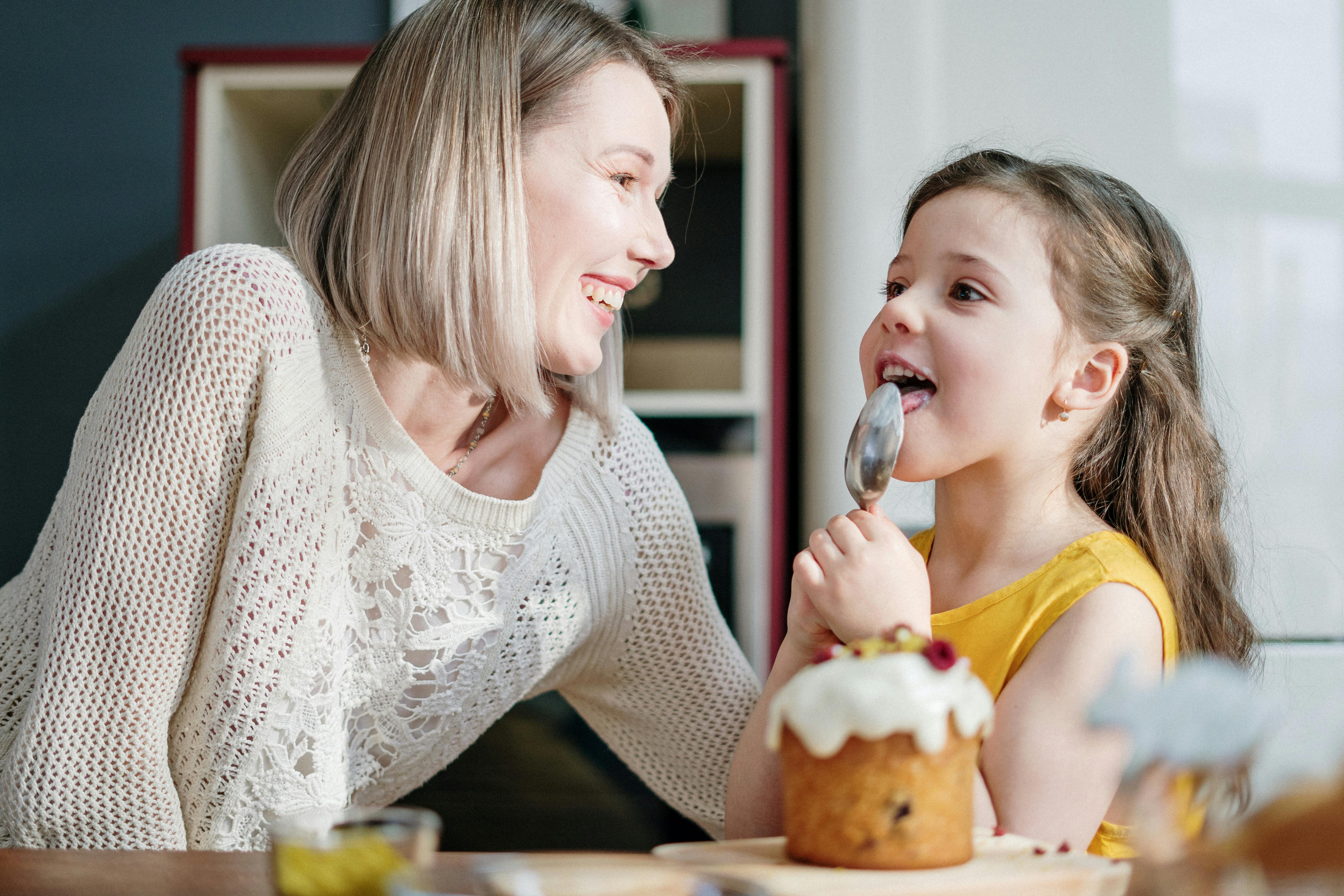 Woman with her daughter on her kitchen | Source: Pexels