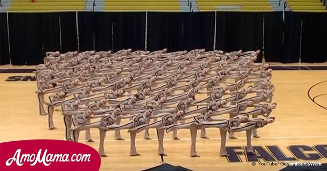 Dancers line up in a round formation. But when the music starts, their bodies begin to move