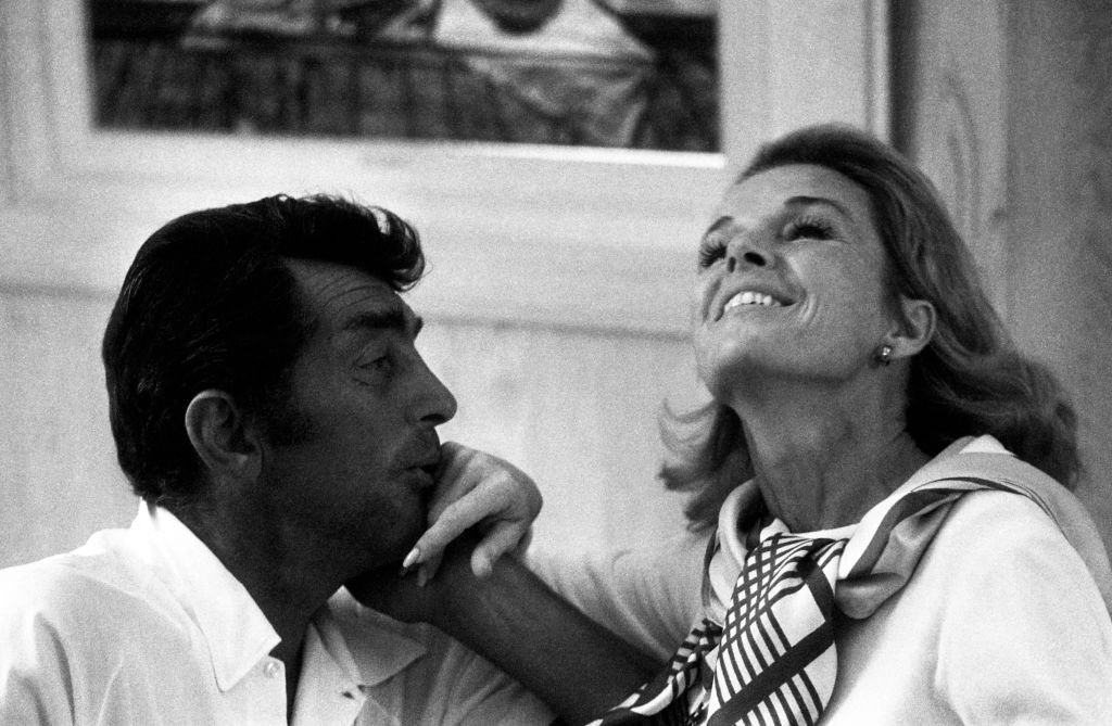 American singer, actor, comedian, and producer Dean Martin and his wife Jeanne Martin have a laugh at home circa November, 1967 in Los Angeles | Photo: Getty Images