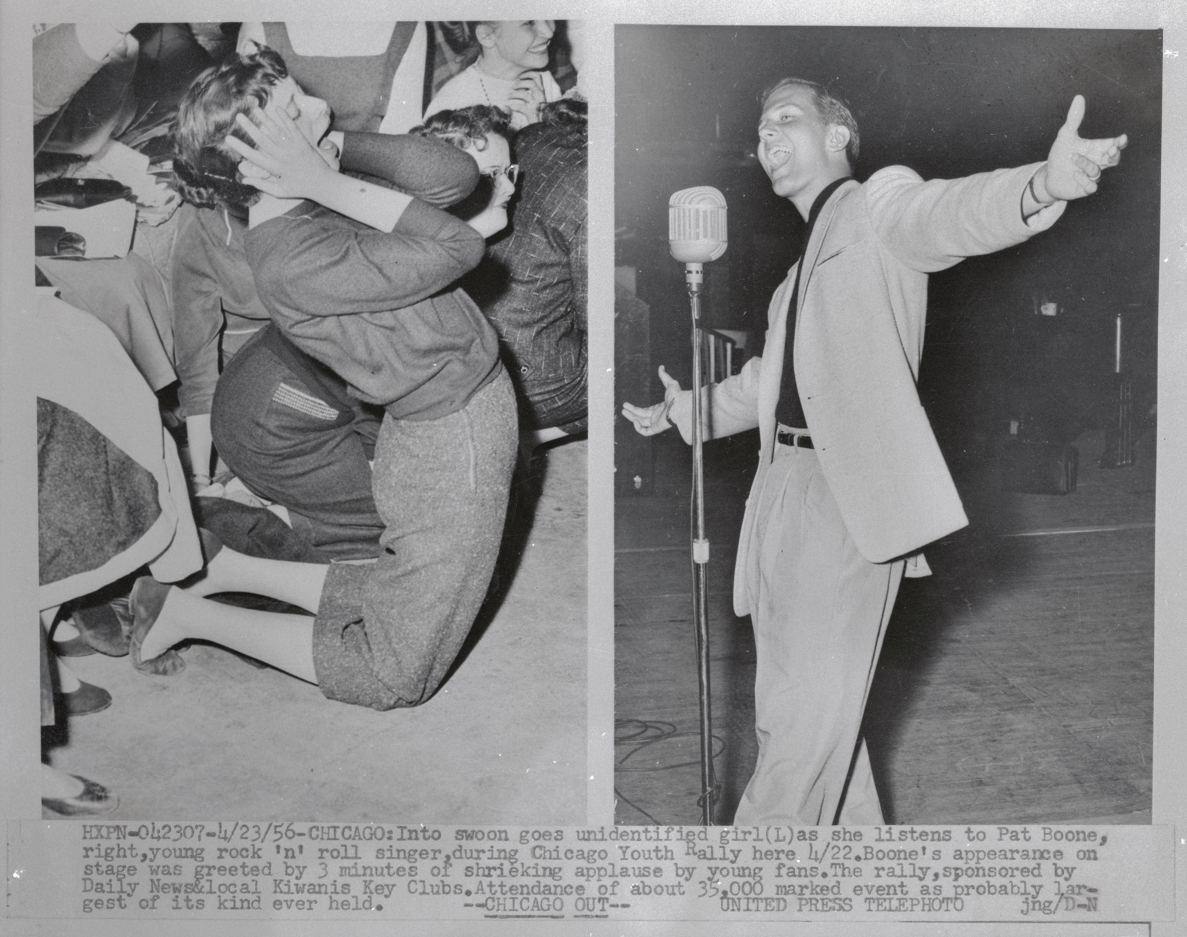 An unnamed girl shrieks approval as rock and roll singer Pat Boone belts out a song during a Chicago youth rally, circa April 1956 | Source: Getty Images