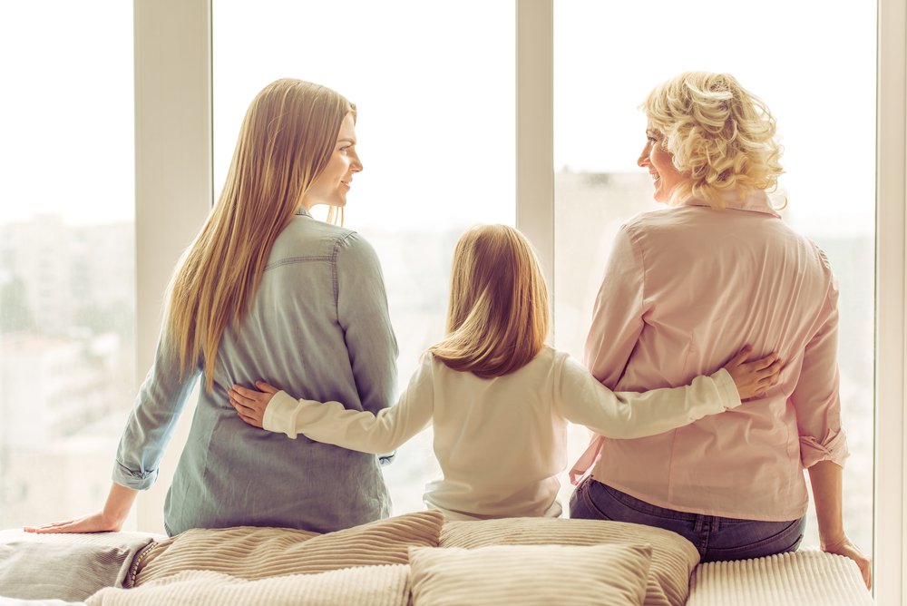 A photo of a family's three generation 'Daughter, Mother and Grand-mother | Photo: Shutterstock