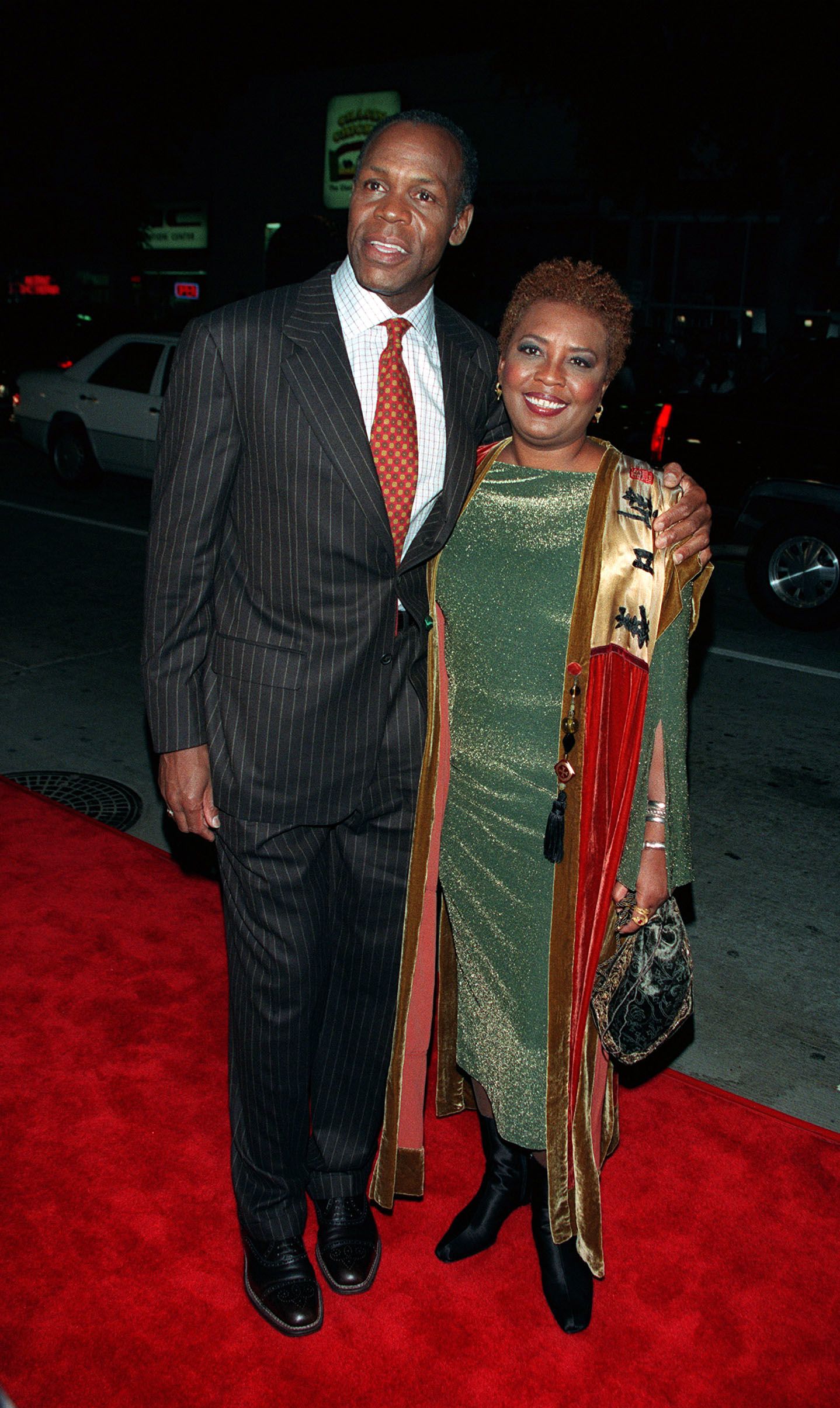 Danny Glover with Asake Bomani at the Westwood premiere of "Beloved" on October 12, 1998. | Source: Frank Trapper/Corbis/Getty Images