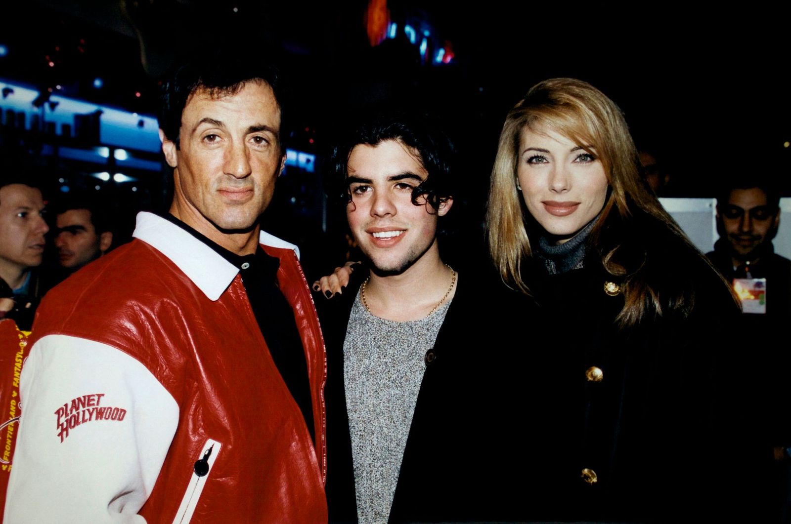 Sylvester and Sage Stallone, and Jennifer Flavin at the inauguration of the  Planet Hollywood restaurant on November 25, 1995, in Marne-la-Vallée, France. | Source: Getty Images