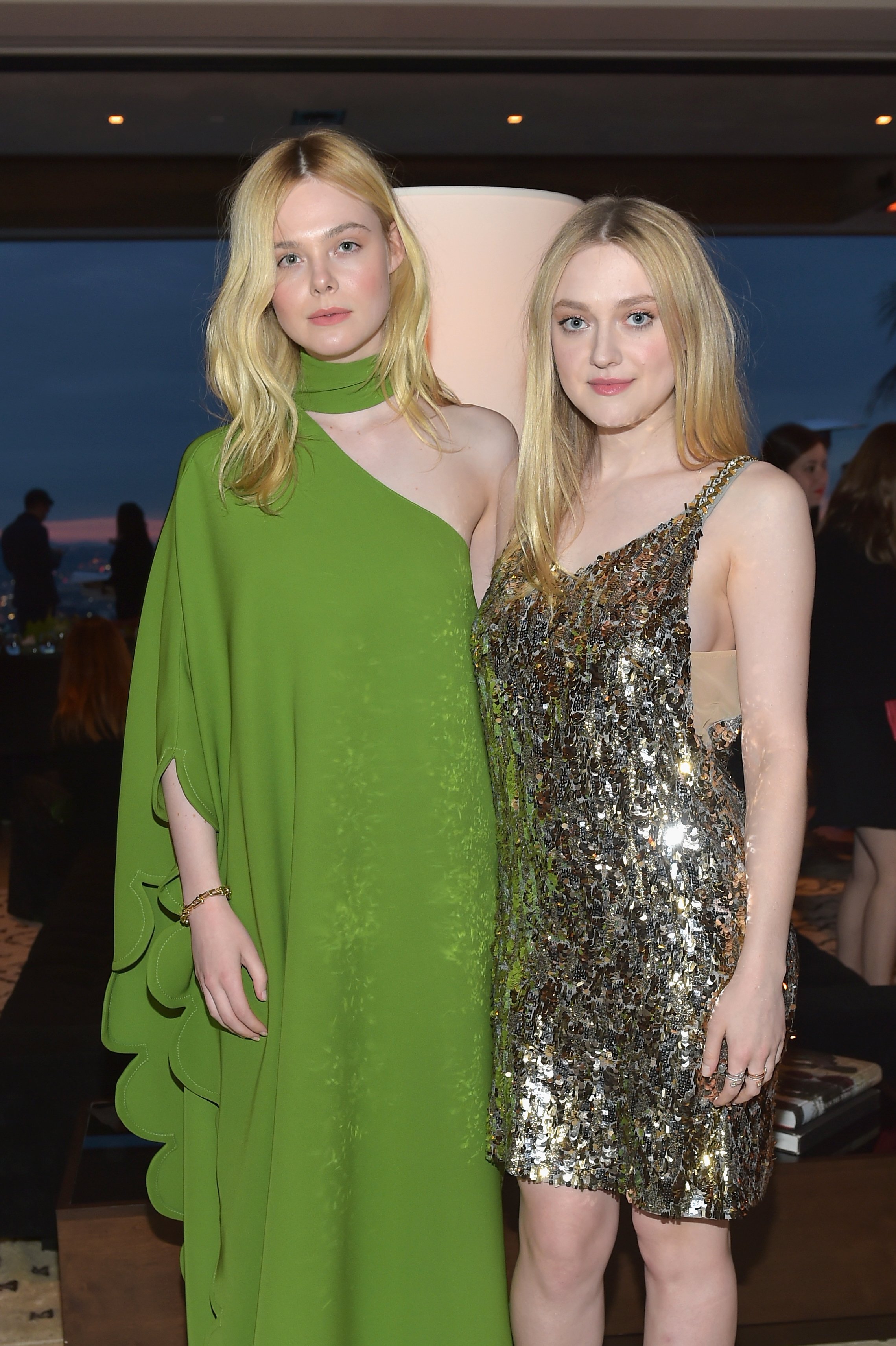 Elle and Dakota Fanning pictured at The Hollywood Reporter and Jimmy Choo Power Stylists Dinner, 2018, Los Angeles, California. | Photo: Getty Images