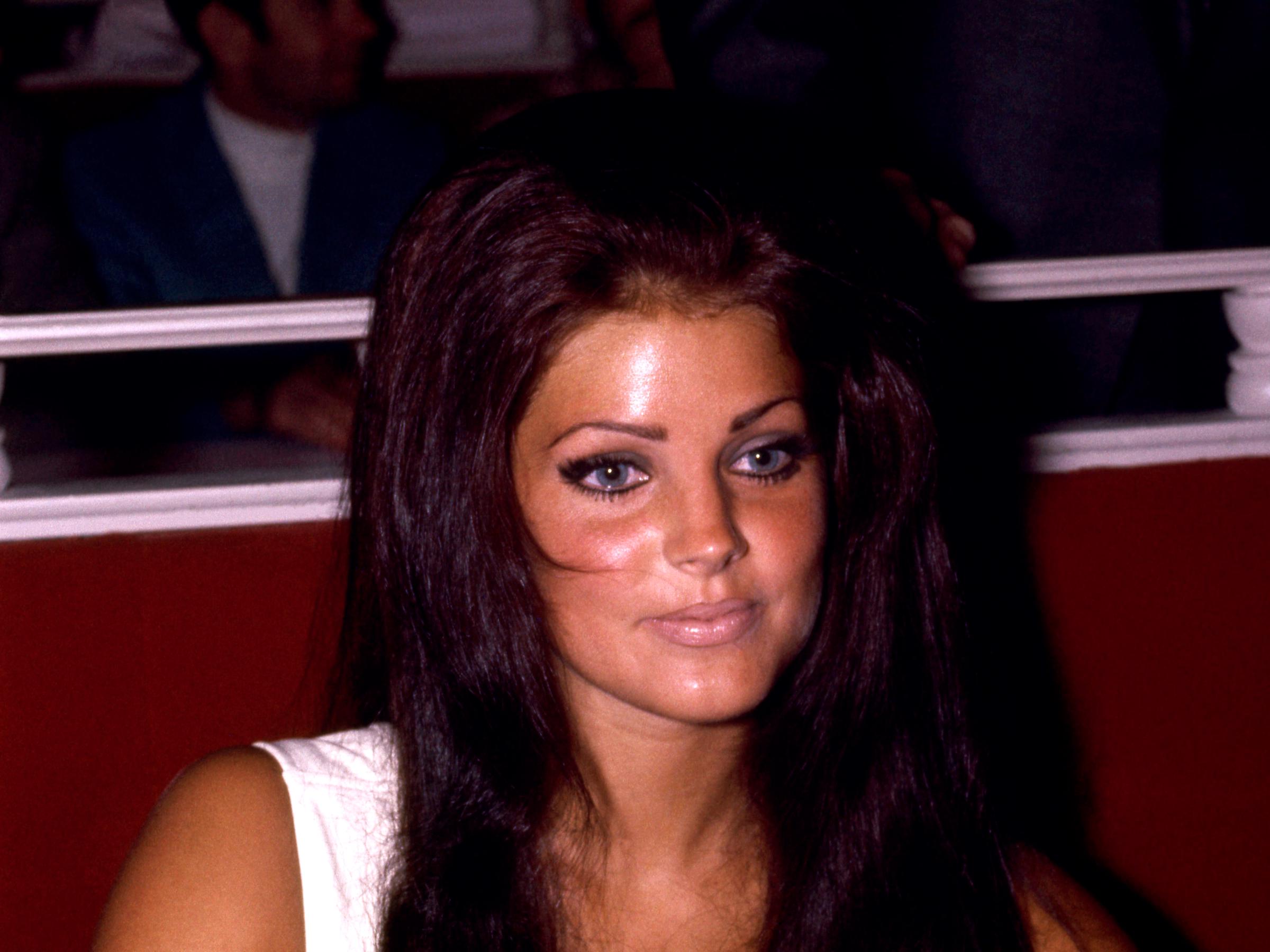 Priscilla Presley sits during her husband Elvis Presley's opening act at the International Hotel in August 1969, in Las Vegas, Nevada. | Source: Getty Images