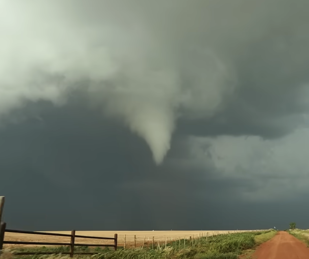 A shot of a tornado forming in a clip from July 19, 2024 | Source: YouTube/HIGH RISK Chris