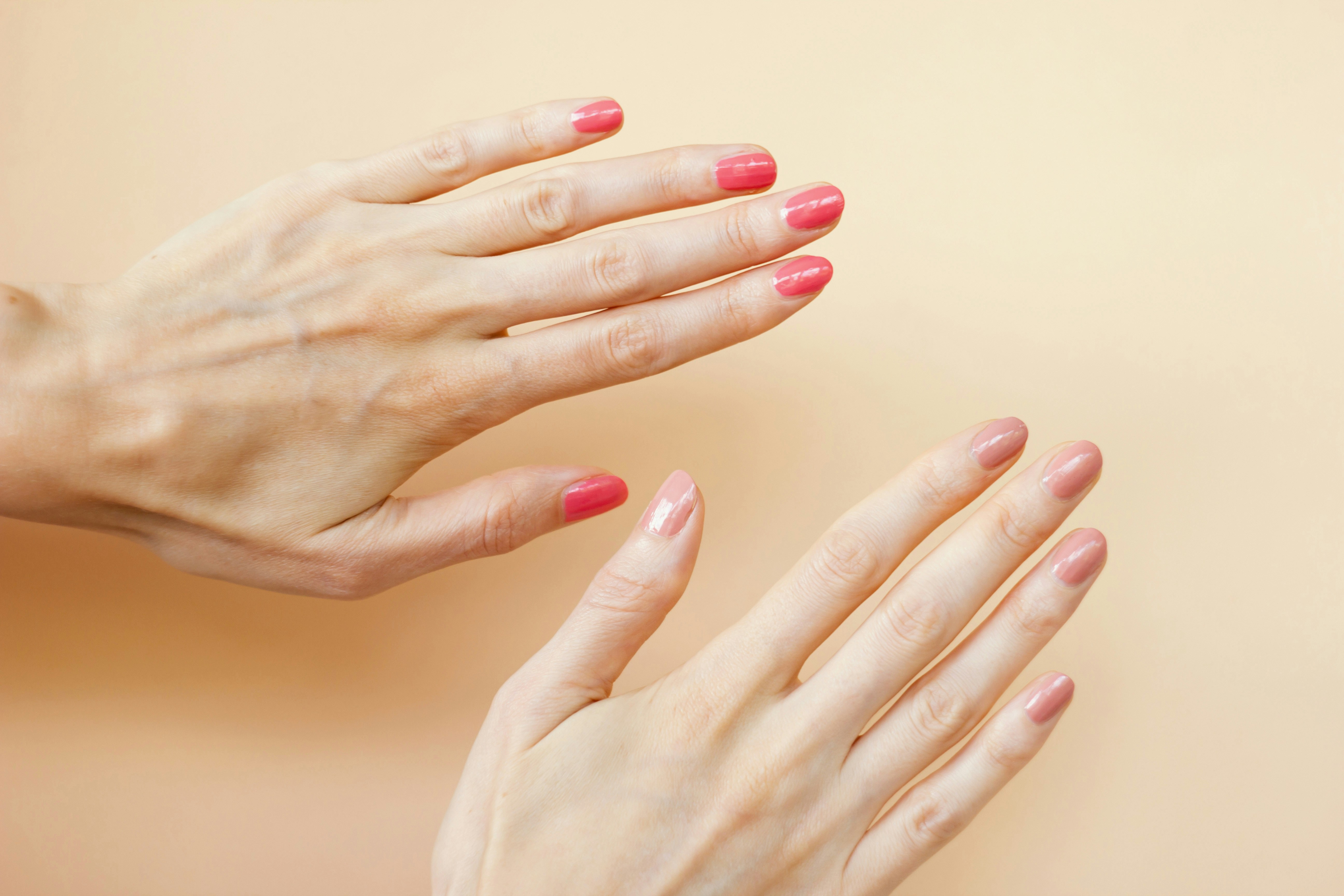 A woman's hands with a fresh manicure | Source: Unsplash
