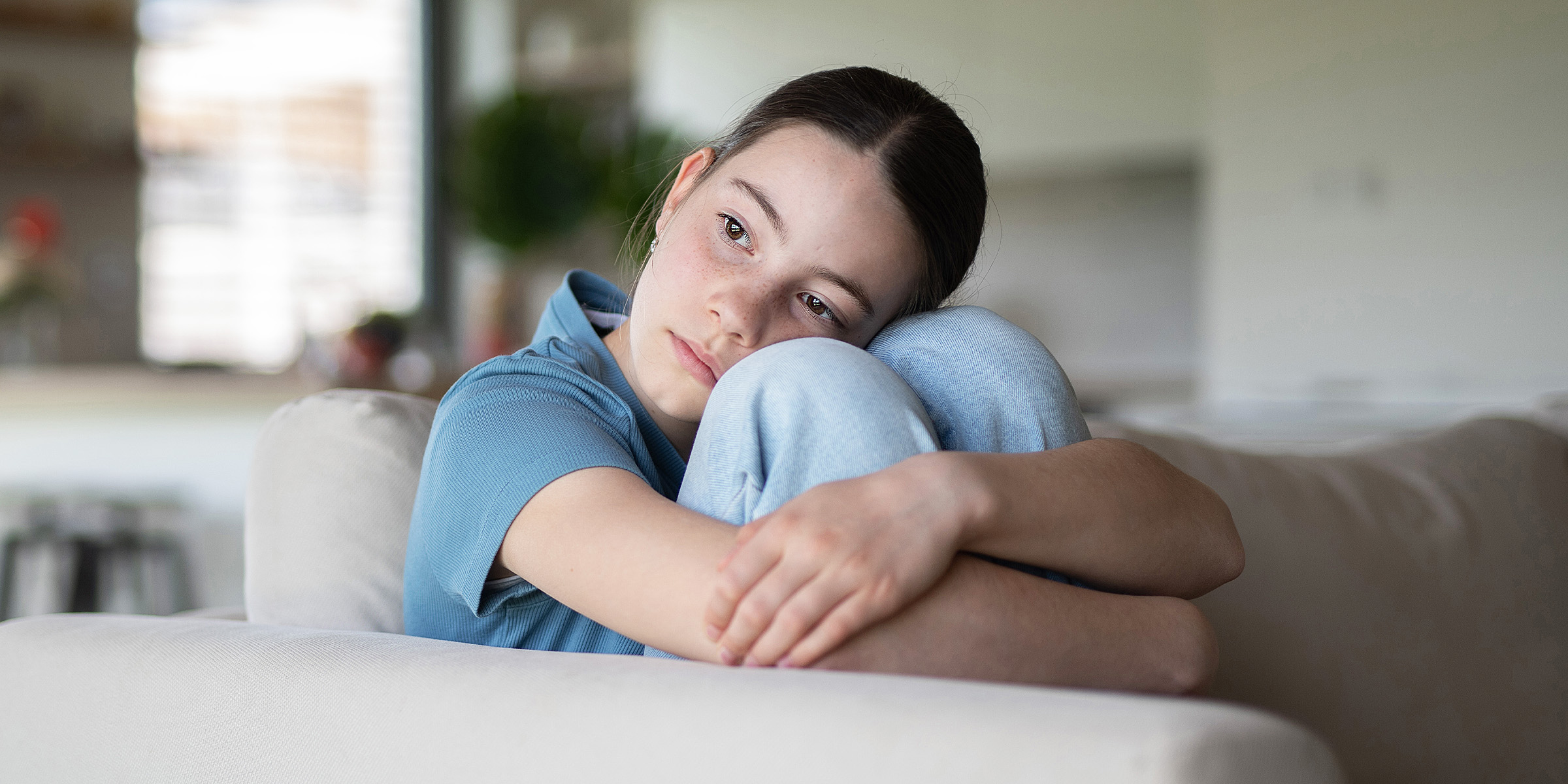A reserved teenage girl | Source: Shutterstock