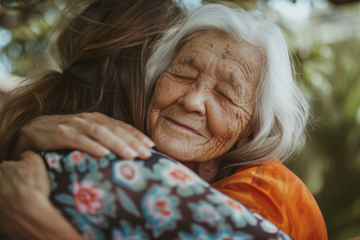 Older lady and young woman embracing each other | Source: AmoMama