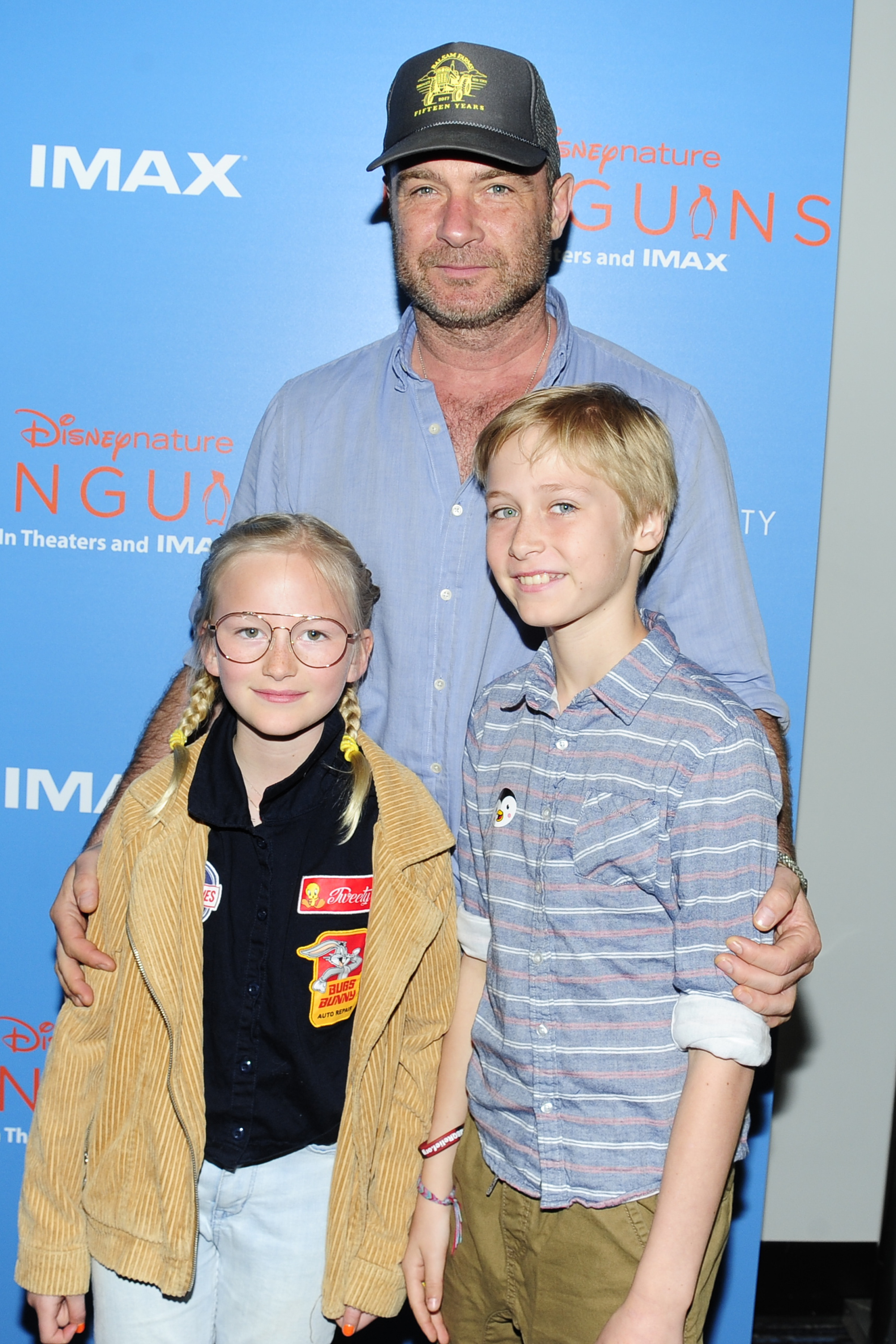 Samuel Kai, Liev, and Sasha Schreiber attend a special screening of "Penguins" on April 14, 2019 | Source: Getty Images