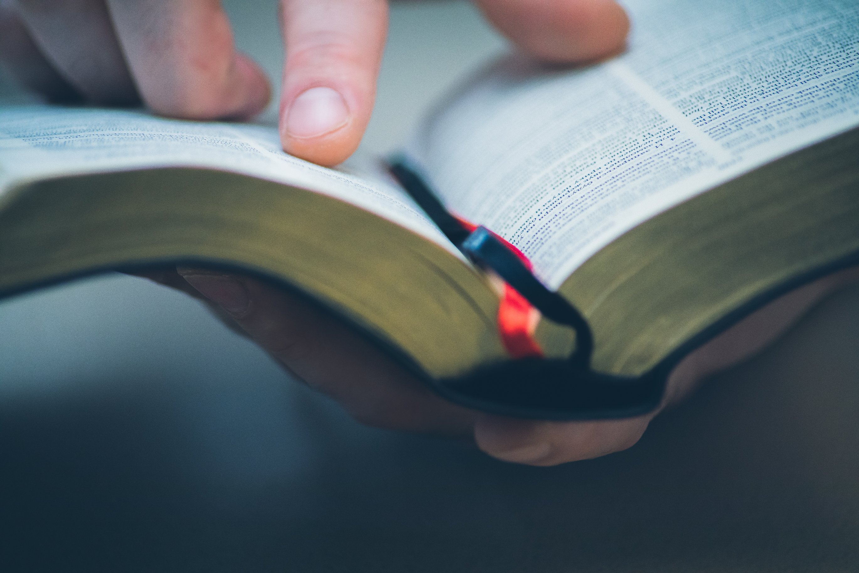 When Brian opened the gift from his dad, he realized it was a Bible. Source: Shutterstock