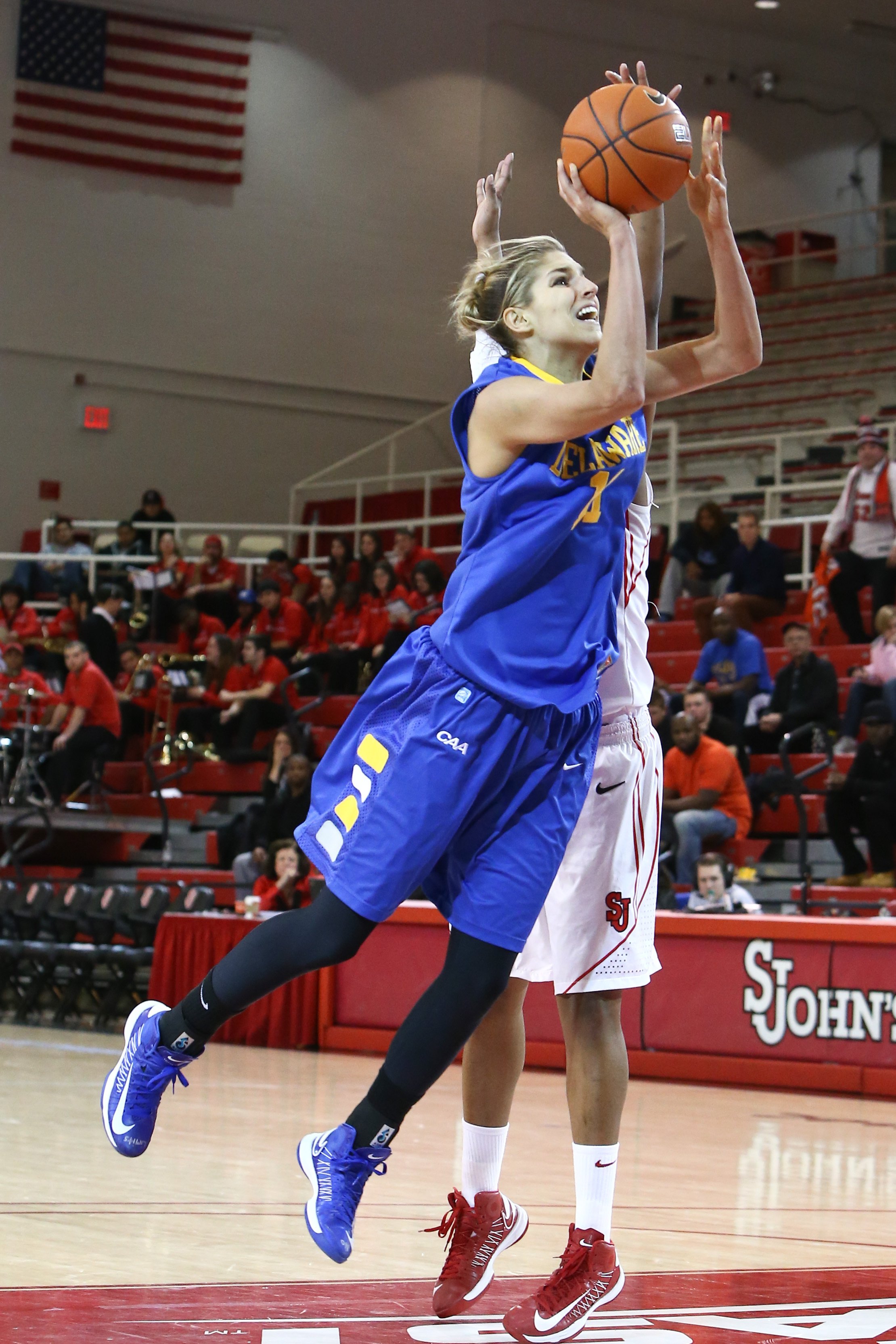Elena Delle Donne (11) goes up for a shot against the St. John's Red Storm at Carnesecca Arena on January 2, 2013 in Jamaica, Queens, New York | Photo: Shutterstock
