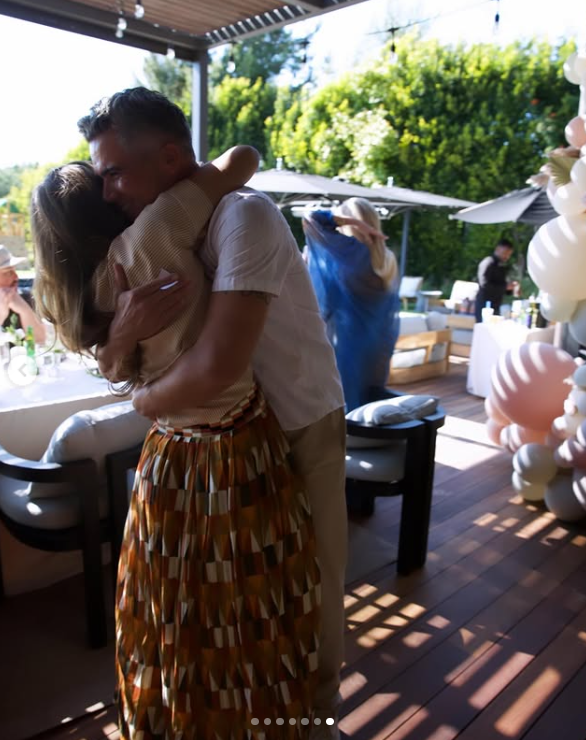 Jessica Alba and Cash Warren share a hug, as posted on May 19, 2024 | Source: Instagram.com/jessicaalba