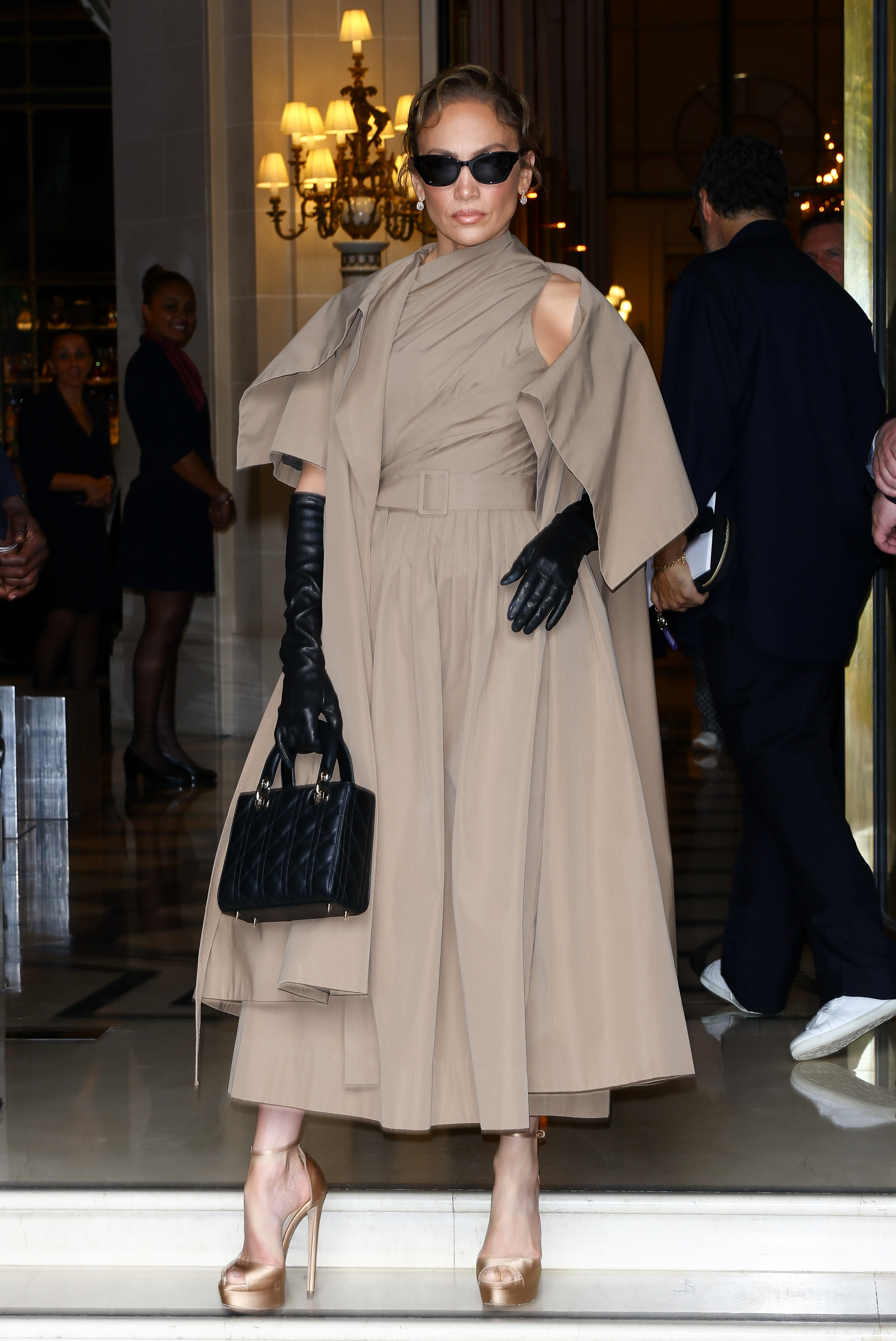 Jennifer Lopez appears serious yet composed as she attends Christian Dior's Fall/Winter 2024 Haute Couture show during Paris Fashion Week on June 24, 2024. | Source: Getty Images