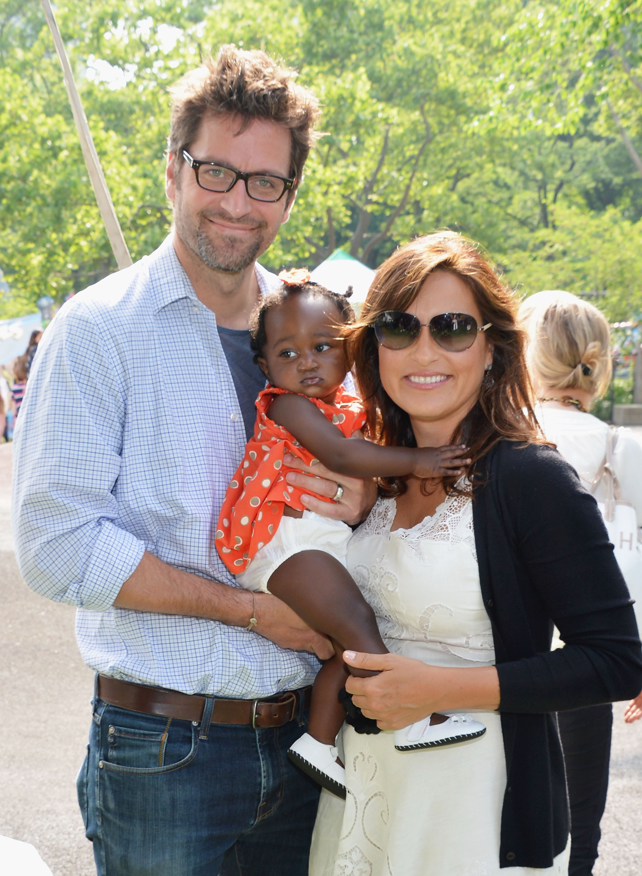 Peter Hermann, Mariska Hargitay, and Amaya Josephine at the 20th Annual Playground Partners Family Party on May 23, 2012, in New York City. | Source: Getty Images