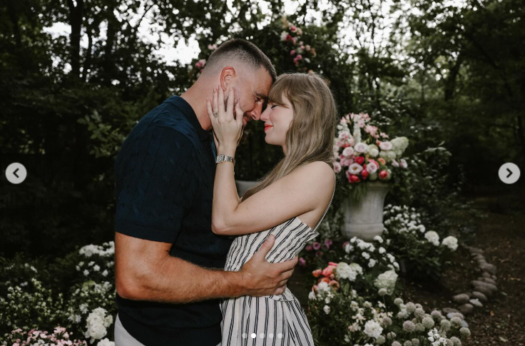 Sealed with a forehead touch! The superstar singer and NFL tight end share an intimate moment in a floral wonderland, as posted on August 26, 2025 | Source: Instagram/taylorswift