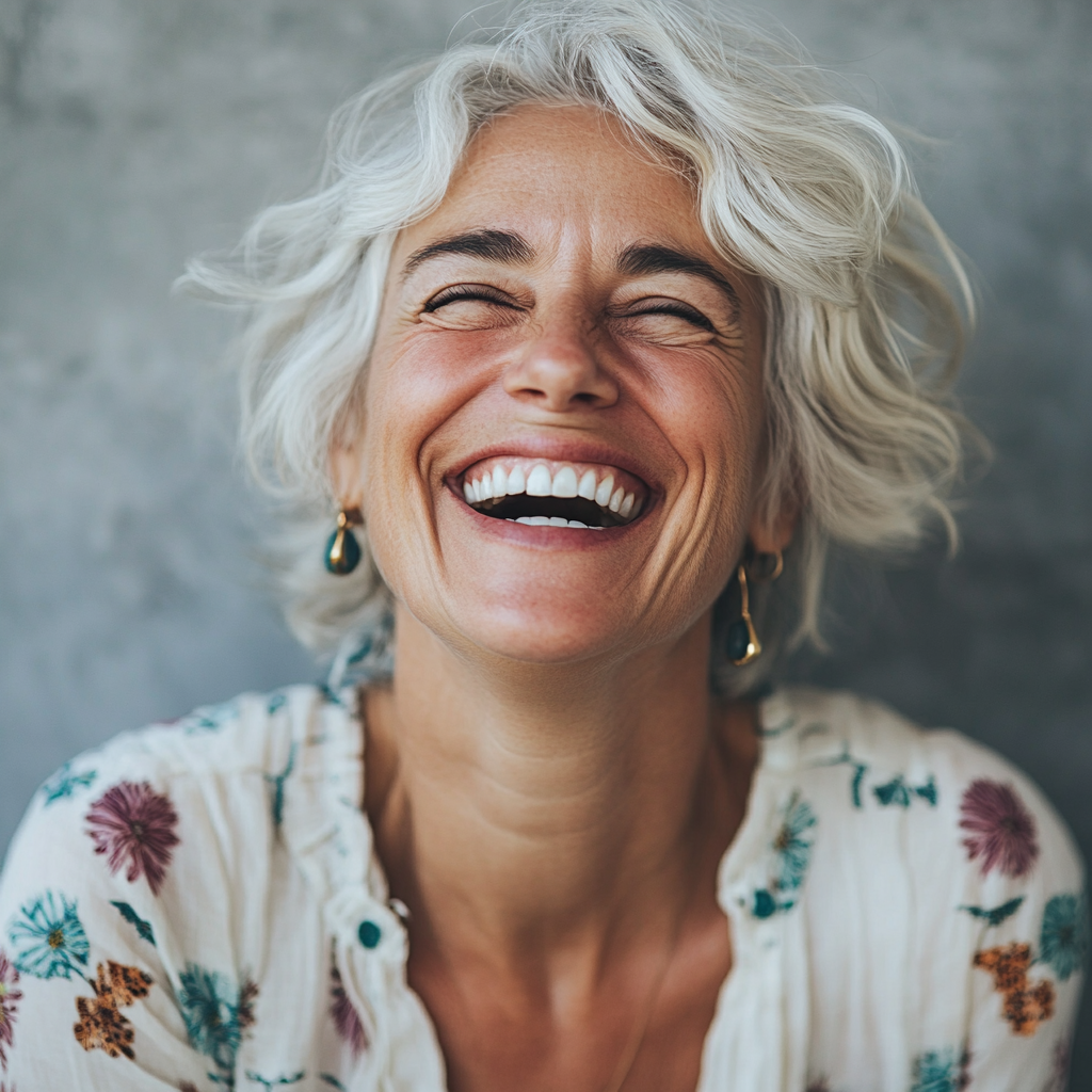 An older woman laughing | Source: Midjourney