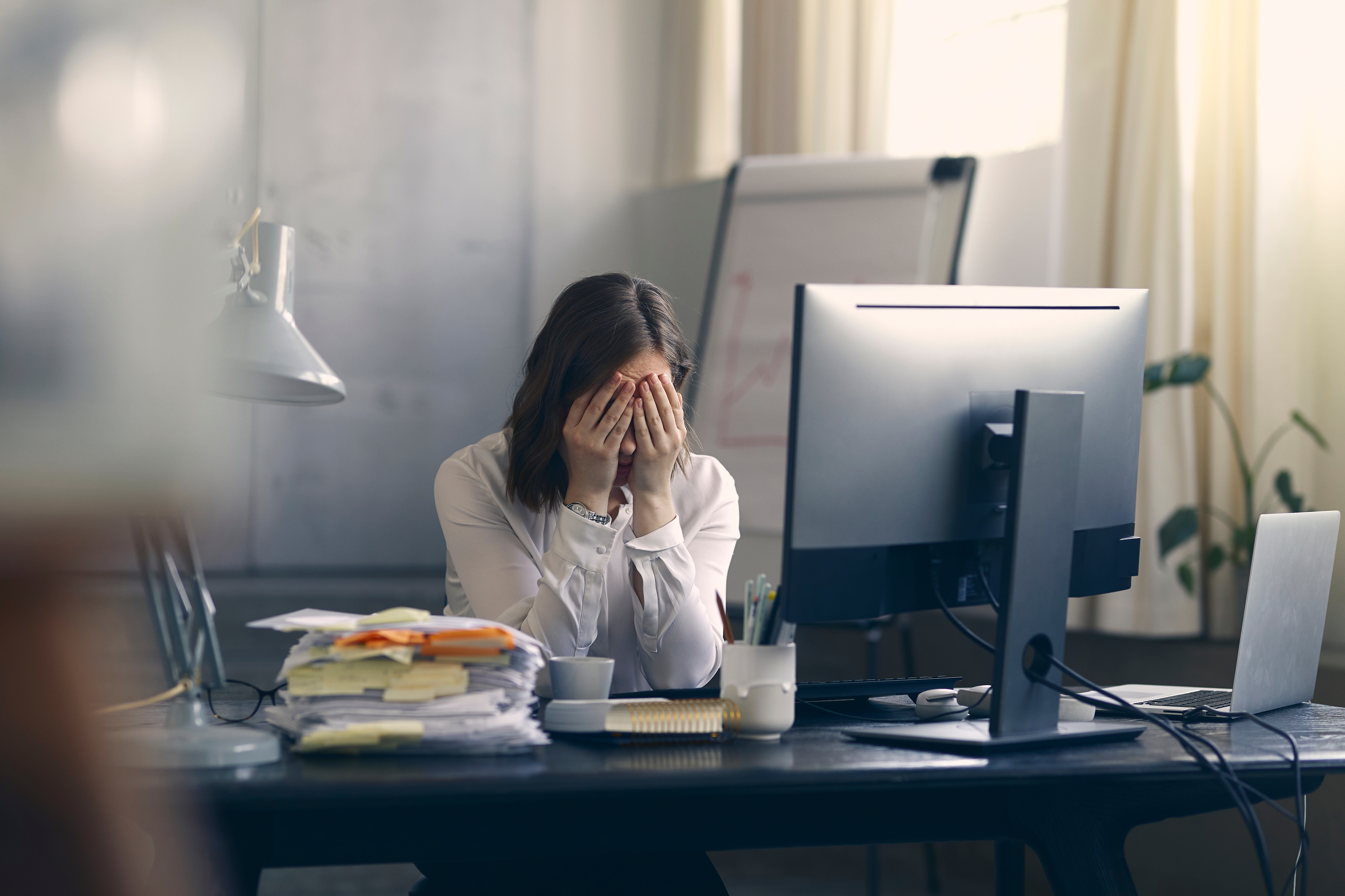 A stressed employee | Source: Shutterstock