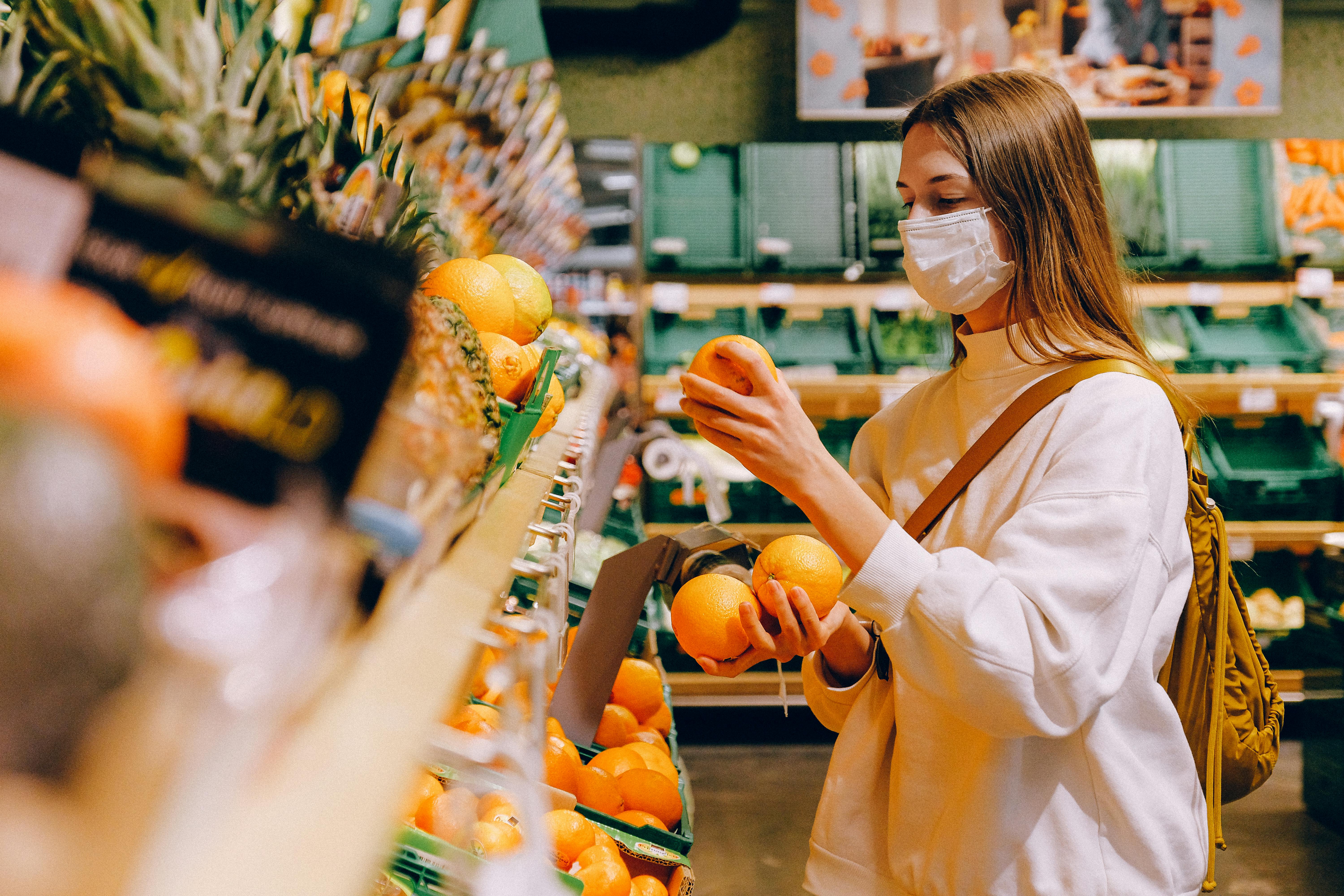 A woman grocery shopping | Source: Pexels