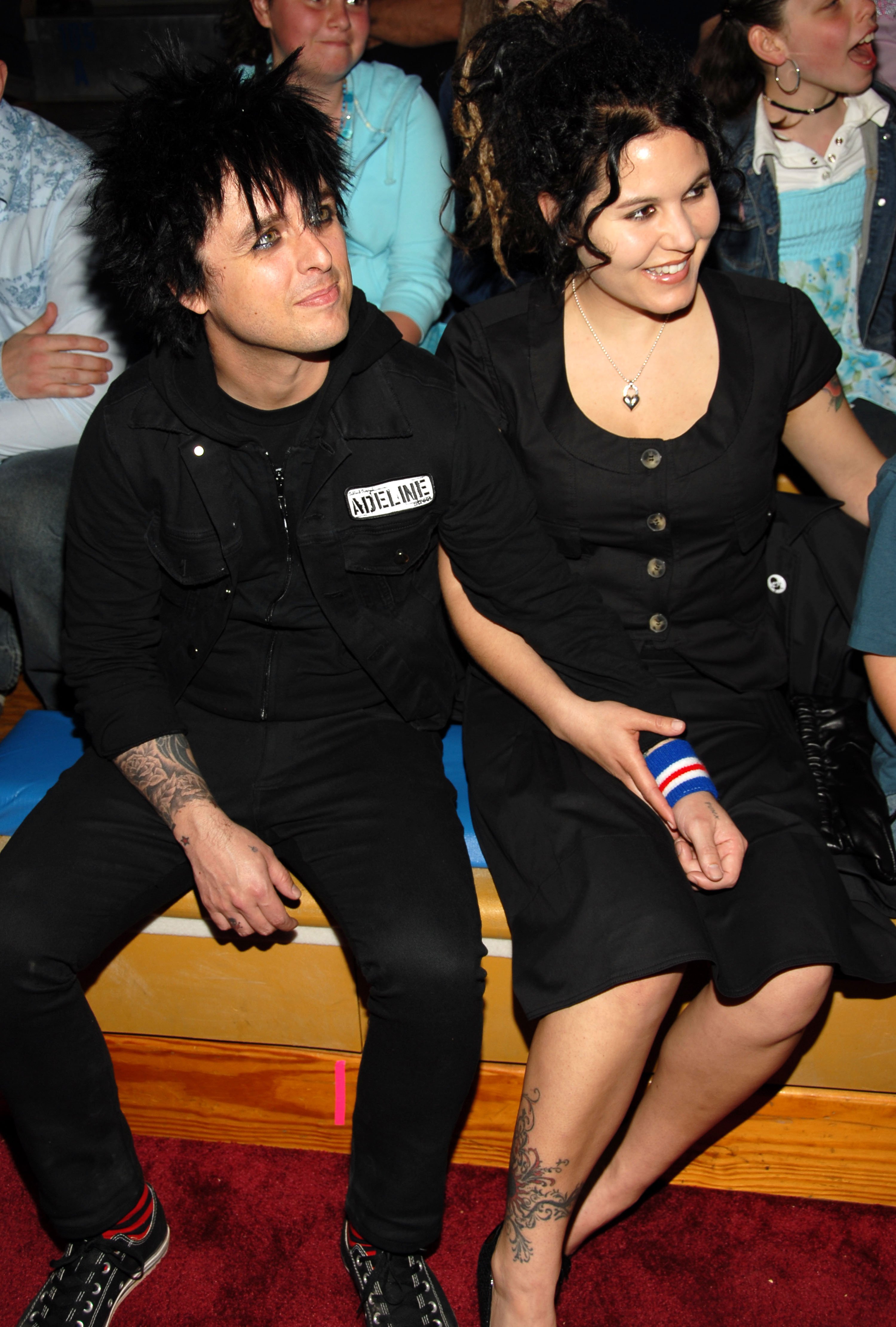 Billie Joe Armstrong and Adrienne Nesser are pictured at Nickelodeon's 19th Annual Kids' Choice Awards on an unspecified date | Source: Getty Images