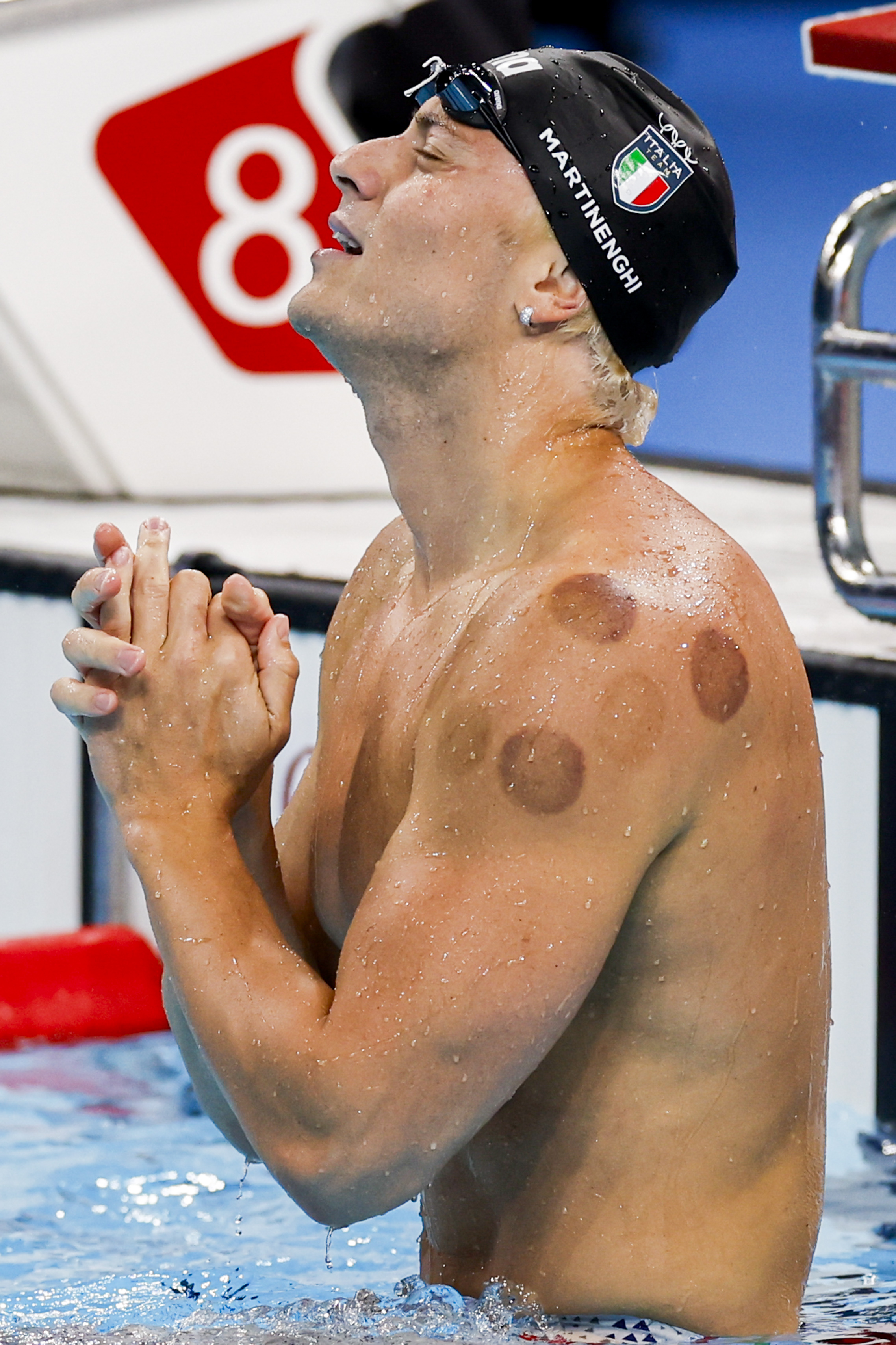 Nicolo Martinenghi of Italy clasps his hands during the Mens 100m Breaststroke Final at the Paris 2024 Olympic Games on July 28, 2024 | Source: Getty Images