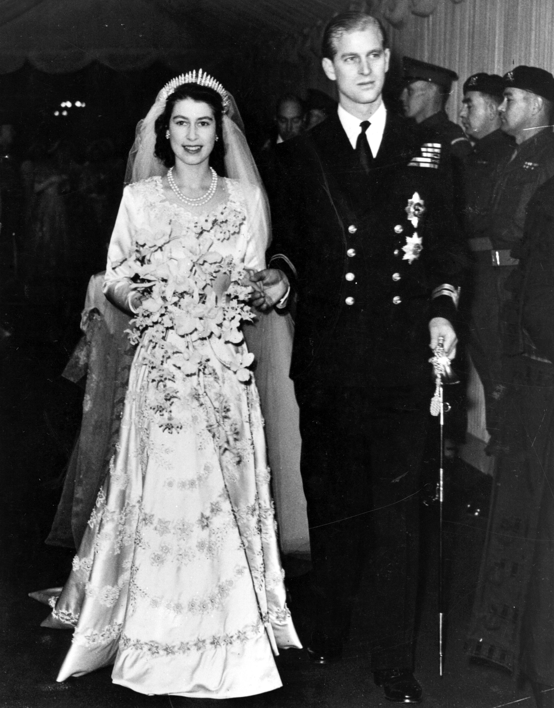 Queen Elizabeth II, as Princess Elizabeth, and her husband the Duke of Edinburgh on their wedding day.  | Source: Getty Images