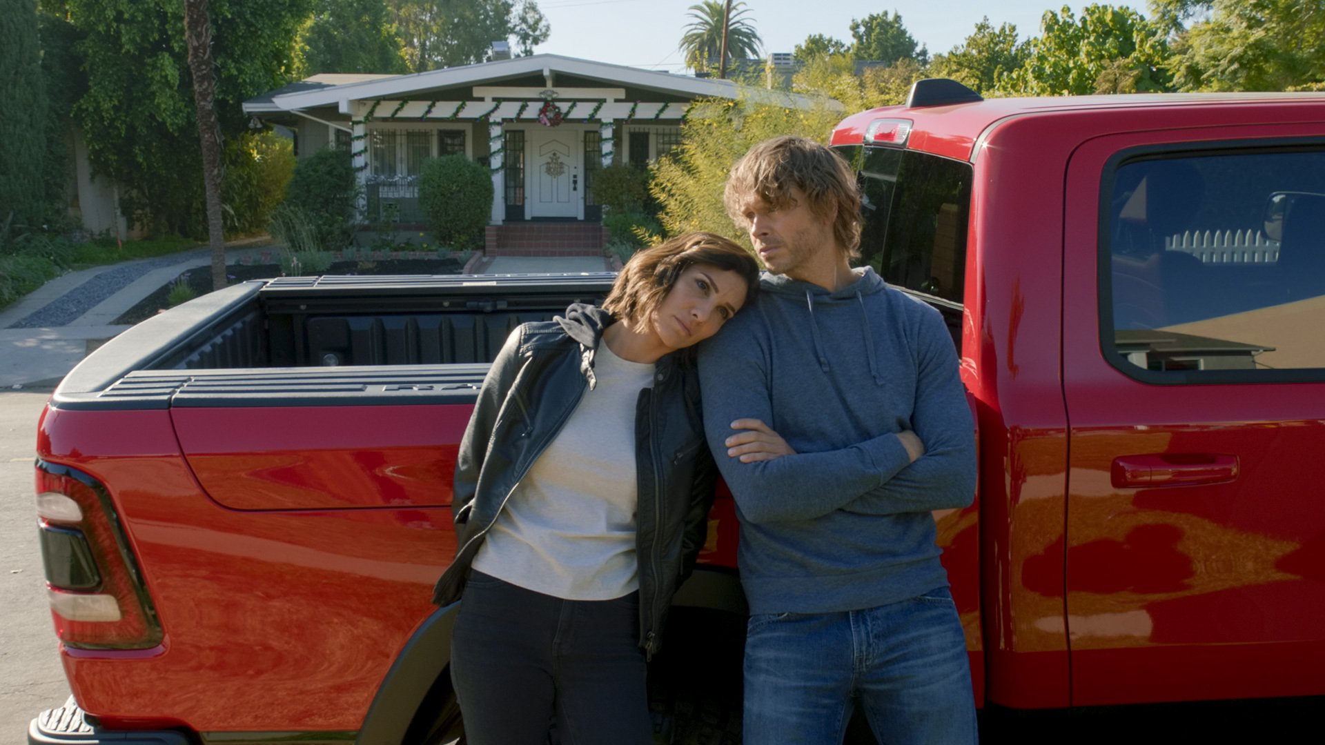 Daniela Ruah and Eric Christian Olsen on the set of the 2009 series "NCIS: Los Angeles. | Photo: Getty Images