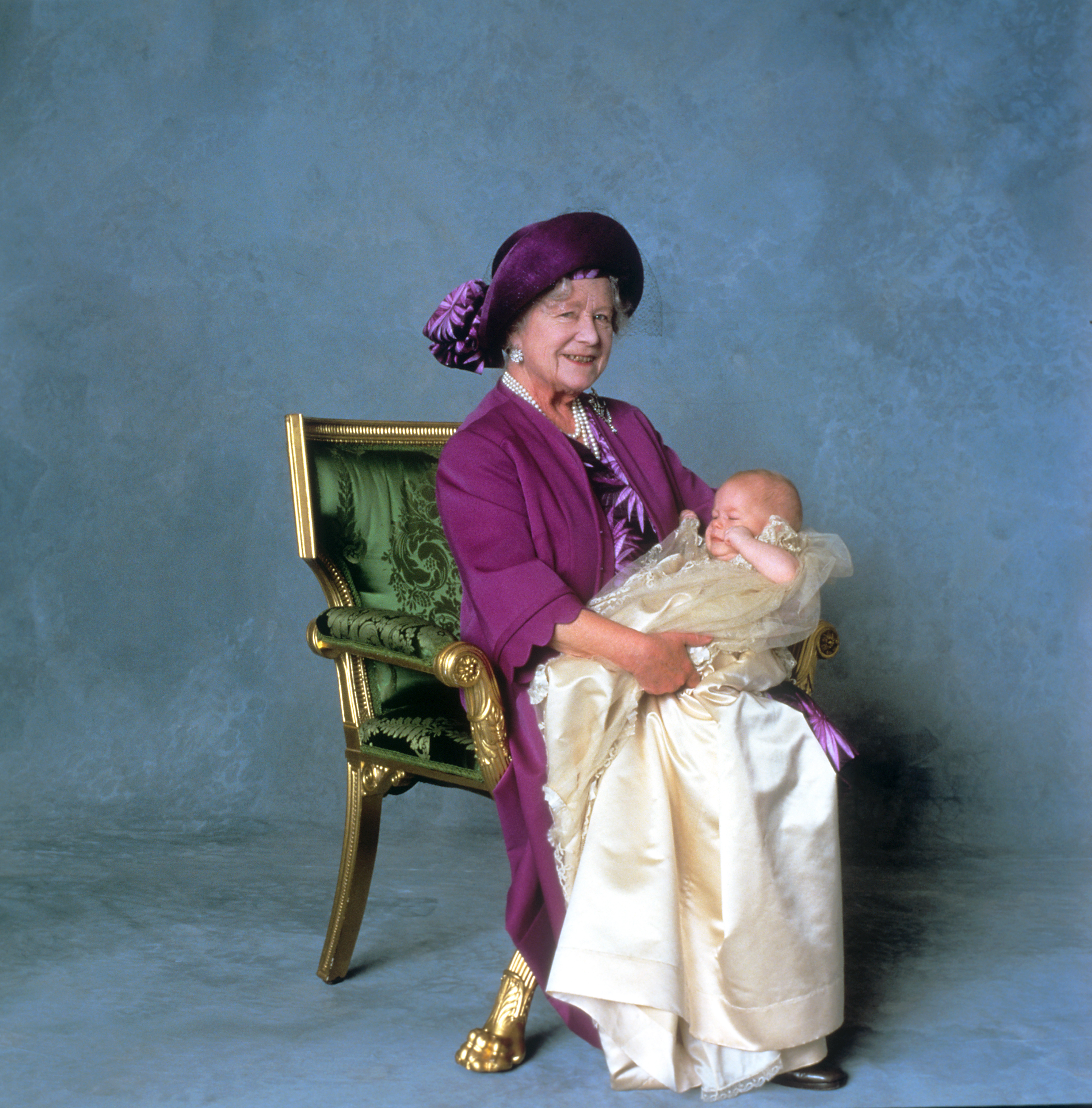 The Queen Mother, Elizabeth Bowes-Lyon and Prince Harry as a baby posing for a picture in 1984. | Source: Getty Images