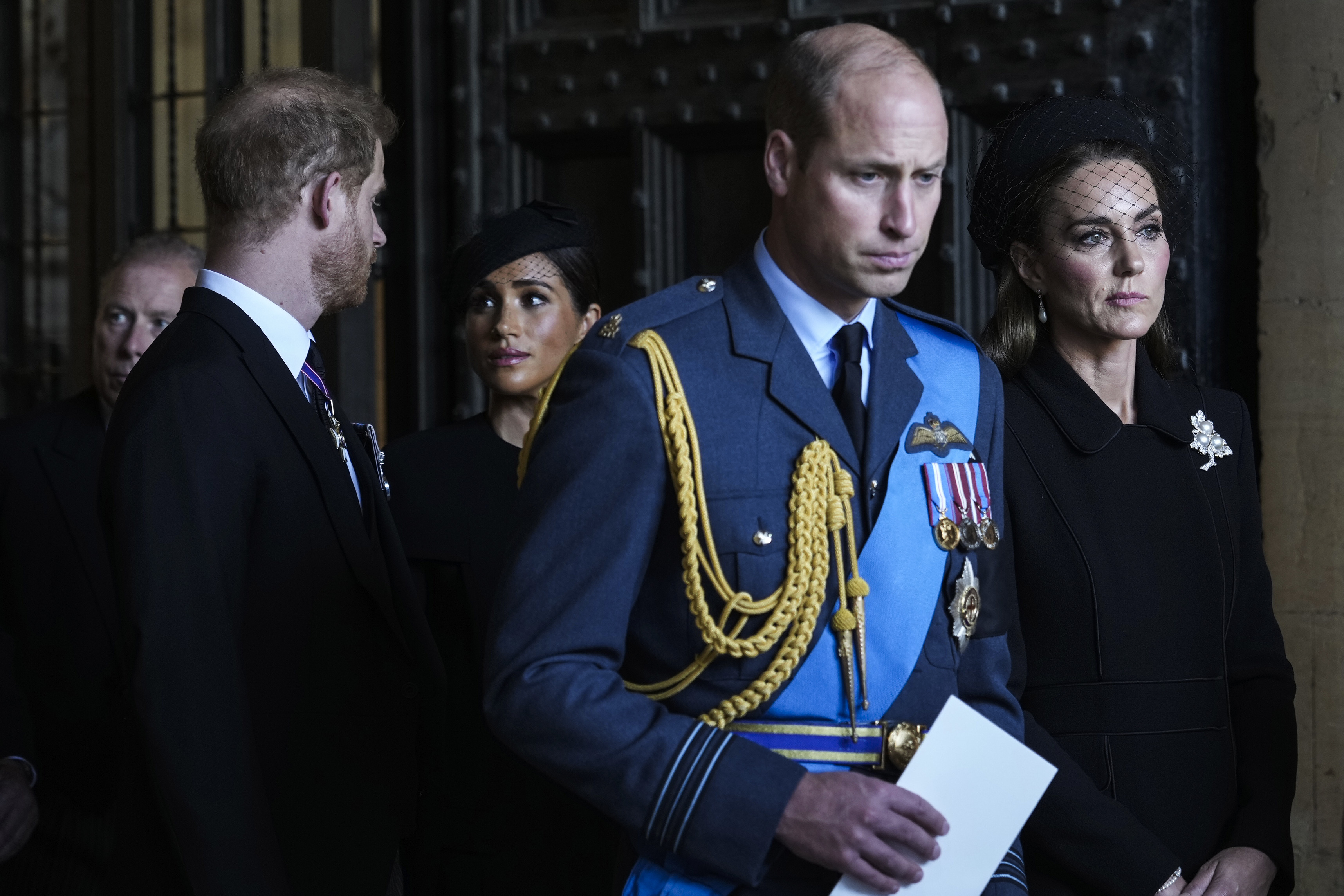 Prince William, Catherine, Prince Harry, and Meghan leave after escorting the coffin of Queen Elizabeth II to Westminster Hall from Buckingham Palace for her lying in state, on September 14, 2022 in London, England | Source: Getty Images