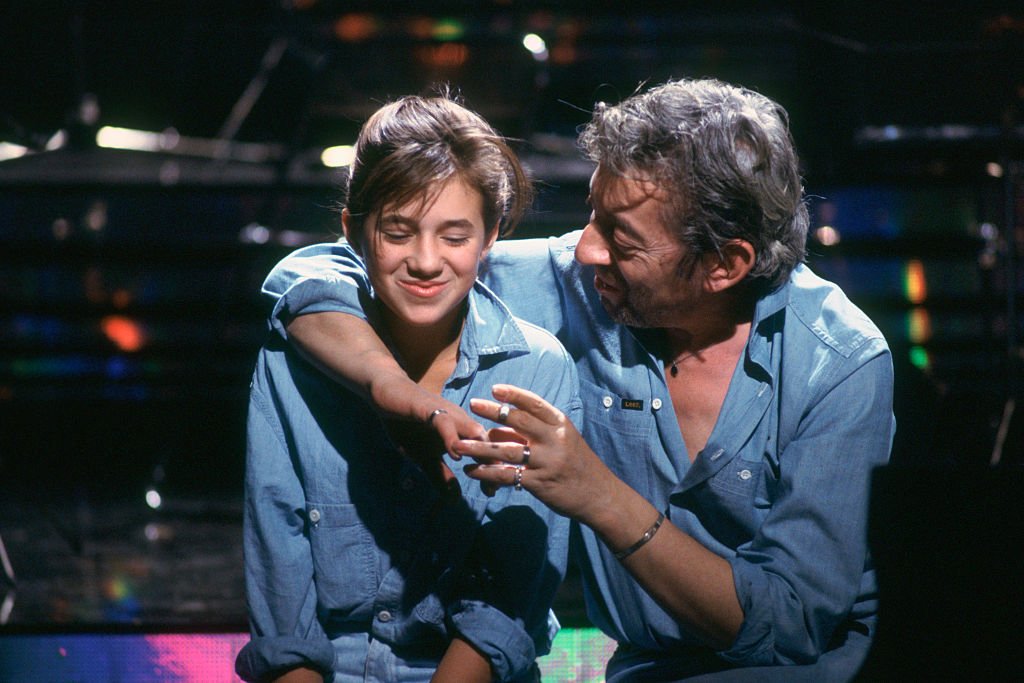 French actress Charlotte Gainsbourg appears on the set of a TV show with her father, singer and composer Serge Gainsbourg.  |  Photo: Getty Images