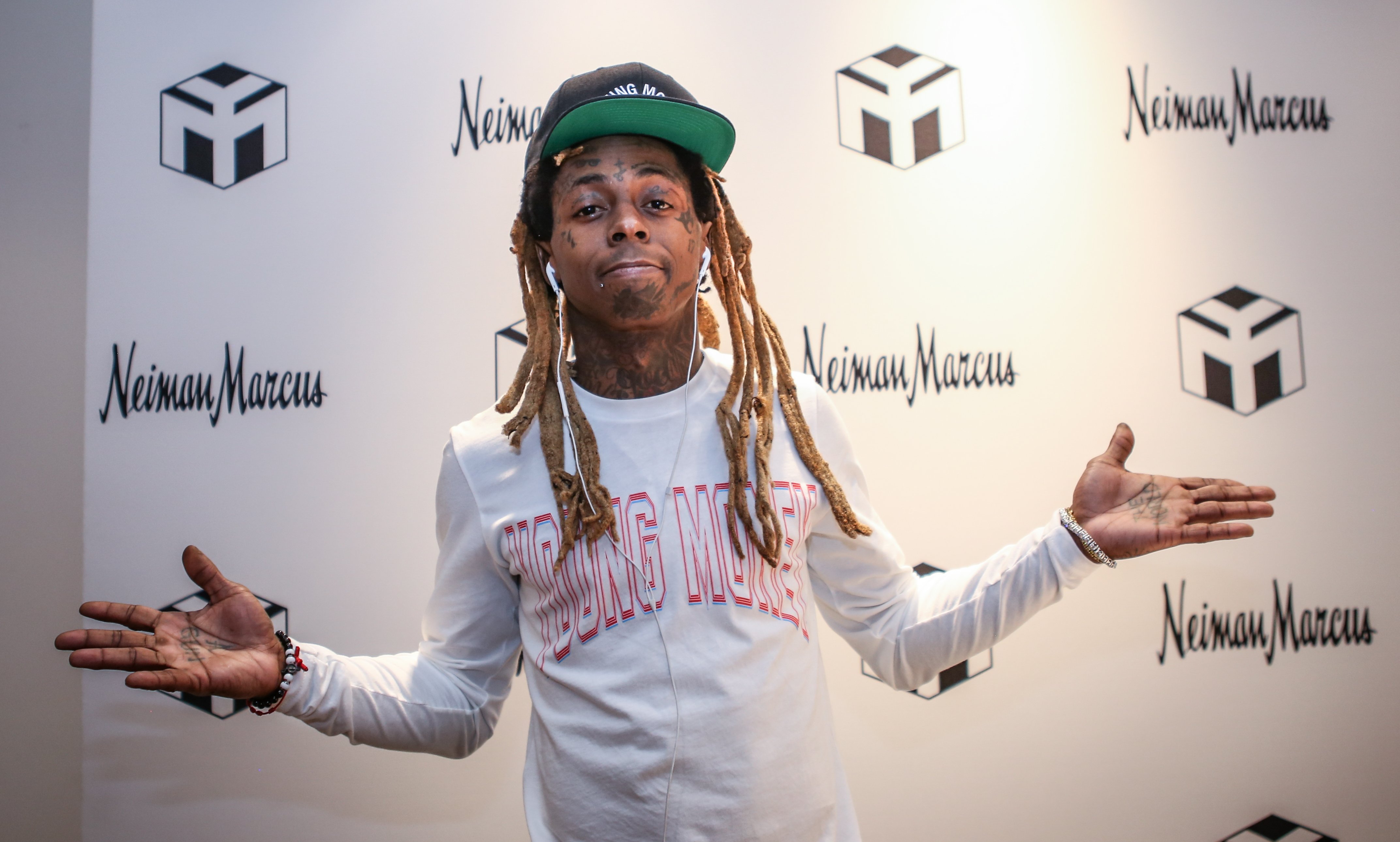 Rapper Lil Wayne, Kameron's father at a Neiman Marcus event in Florida in March 2018. | Photo: Getty Images