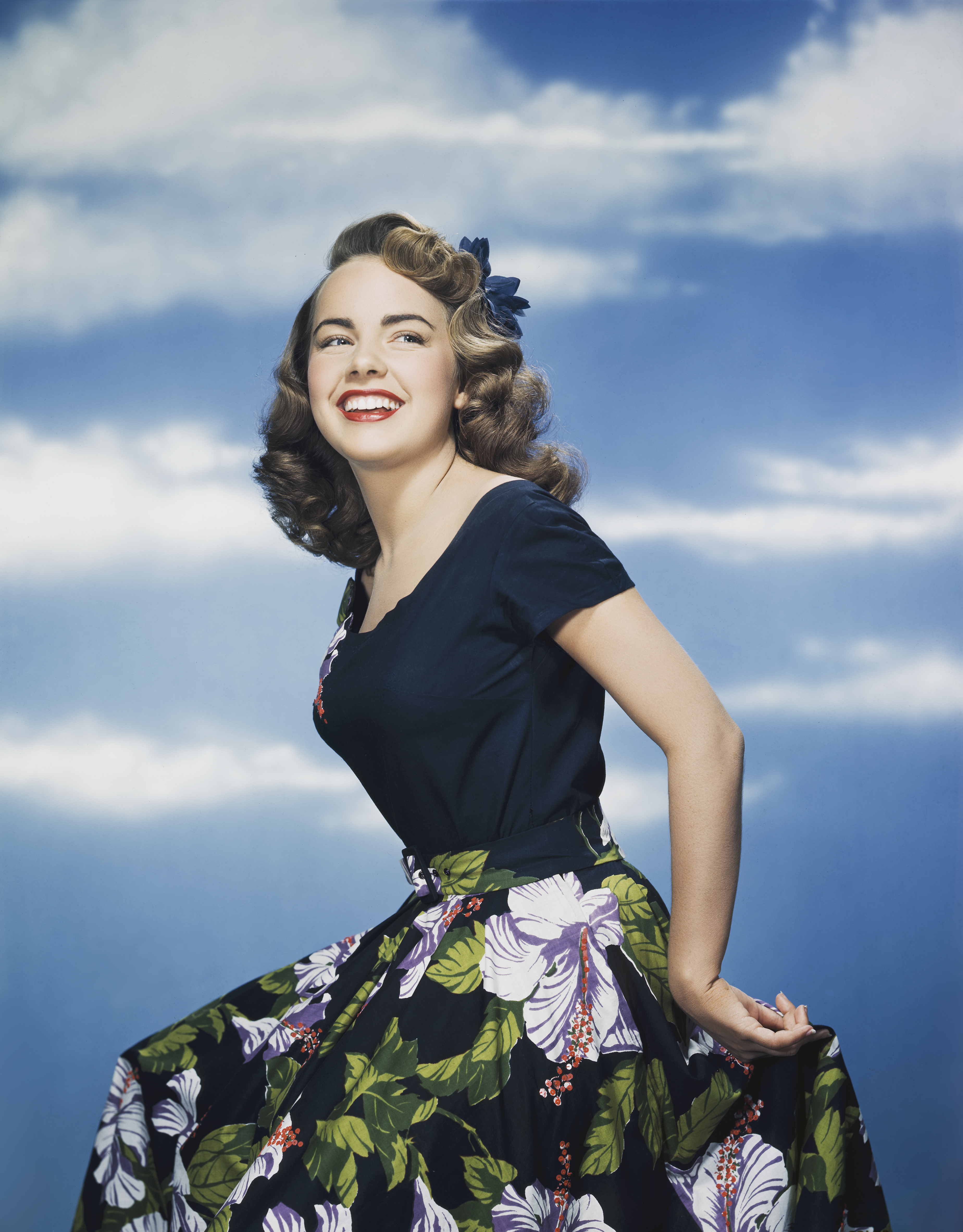 Terry Moore posing for a picture in 1955 | Source: Getty Images