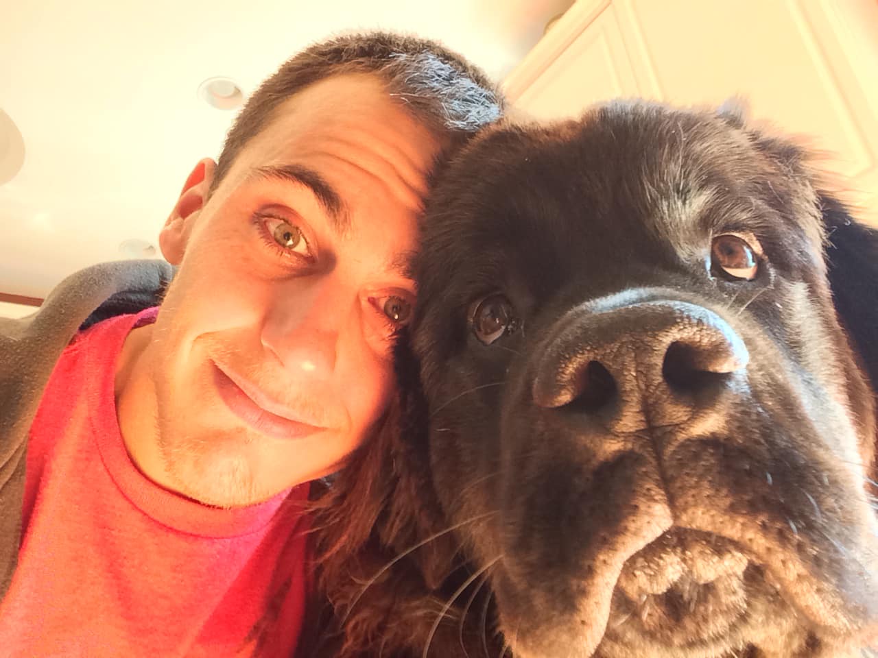 Adam Turck poses with his dog in a photo shared on July 8, 2023. | Source: Facebook/Adam Turck